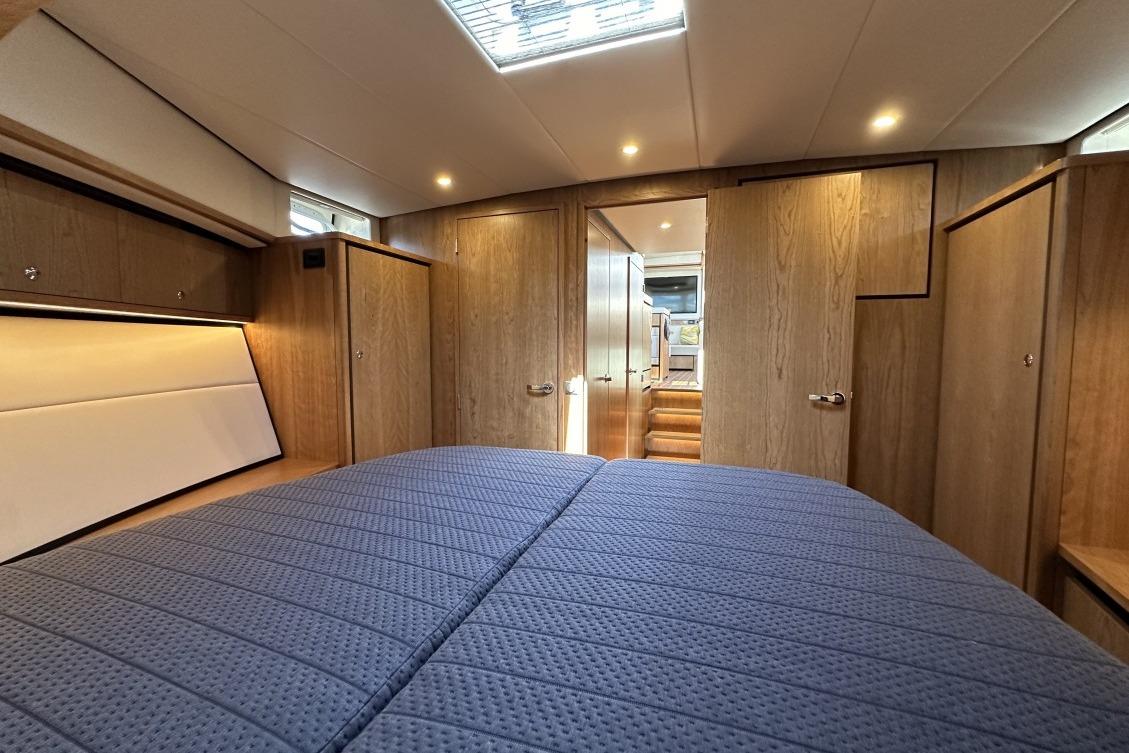 Luxurious cabin interior of 2026 Linssen Grand Sturdy 550 Variotop yacht.