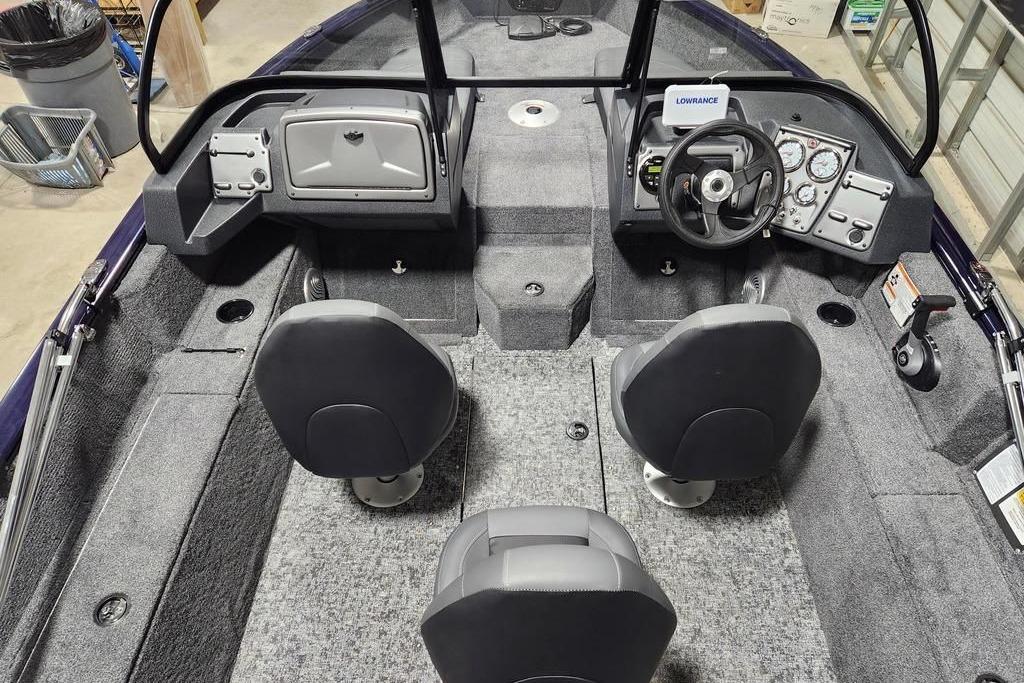 2026 Tracker Pro Guide V-175 Combo boat interior with dual seats and steering console.