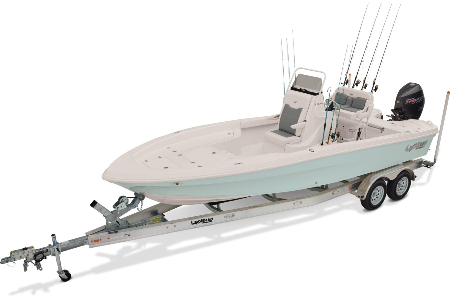 2026 Mako 24 APEX boat on trailer with fishing rods and motor.