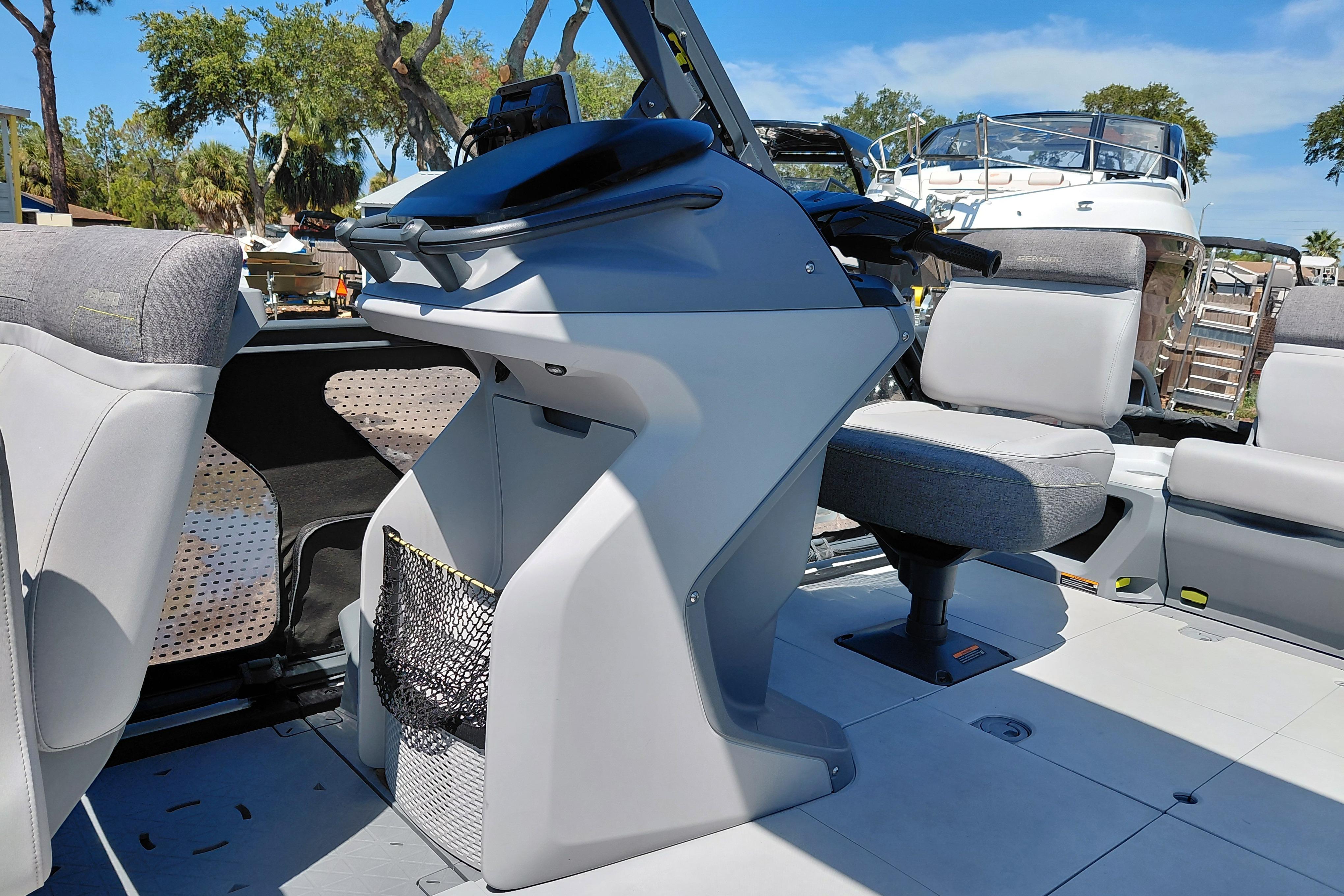 2024 Sea-Doo Switch Cruise 18 interior with modern seating and steering console.
