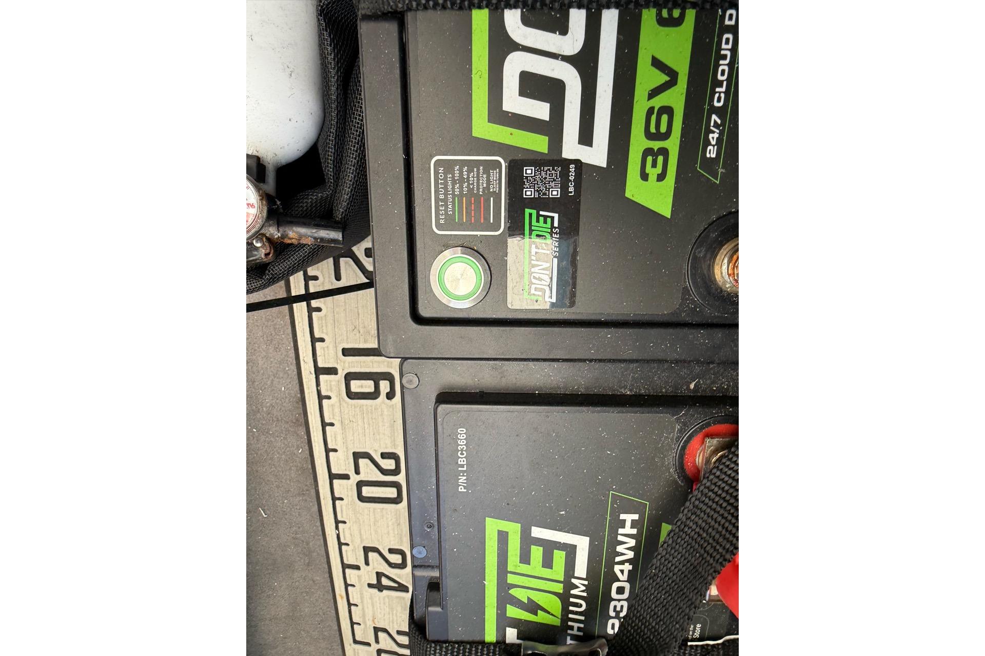 Battery setup on Custom Infusion 34 CC, 2021 model, featuring 36V lithium power.