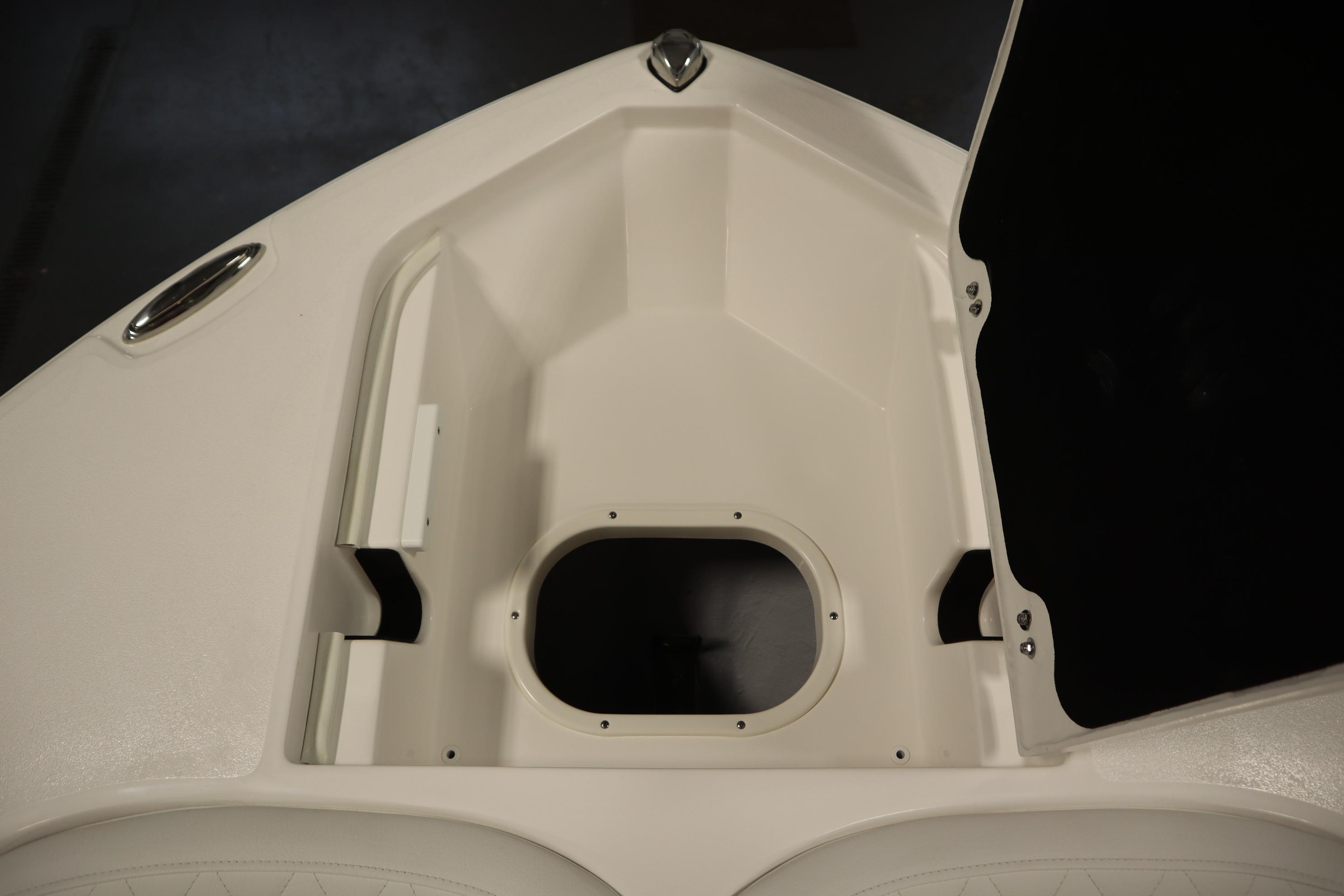 2026 Sea Fox 228 Commander boat interior, featuring a storage compartment and sleek design.