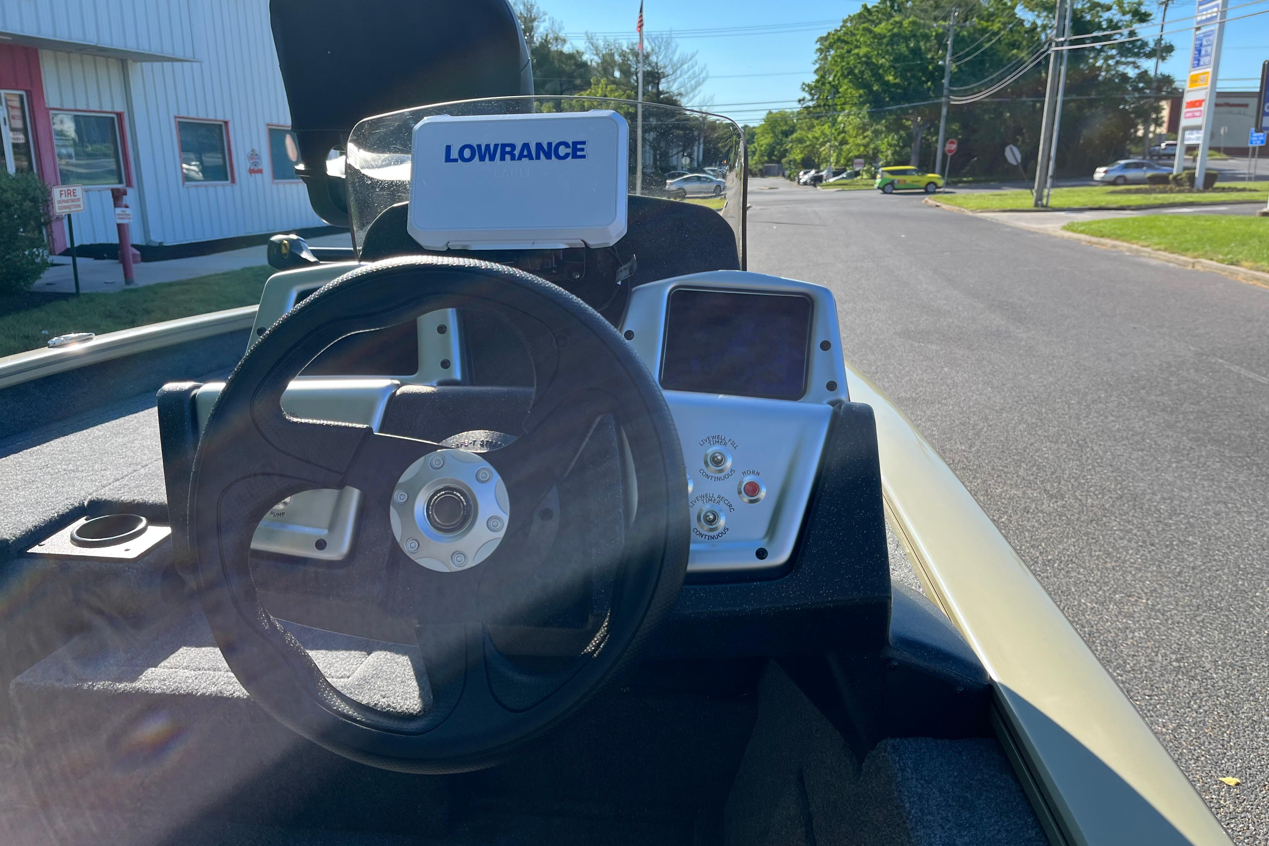 Steering console of 2026 Tracker Pro Team 175 boat with Lowrance display.