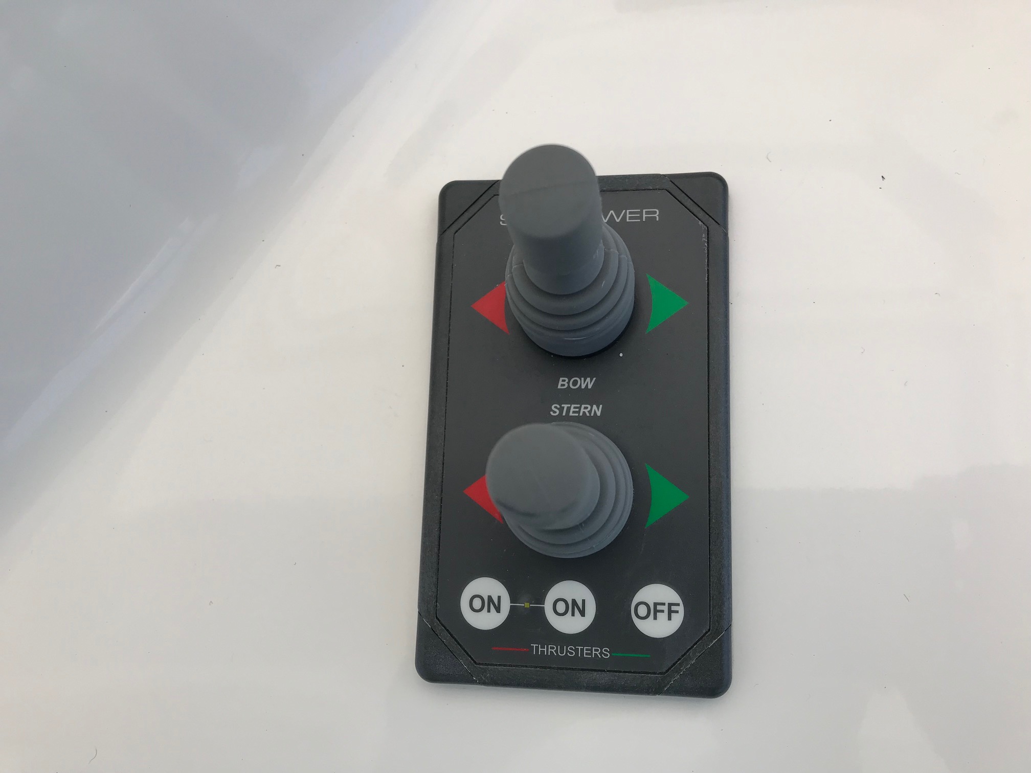 Control panel of a 2017 Sumerset houseboat with bow and stern thruster switches.