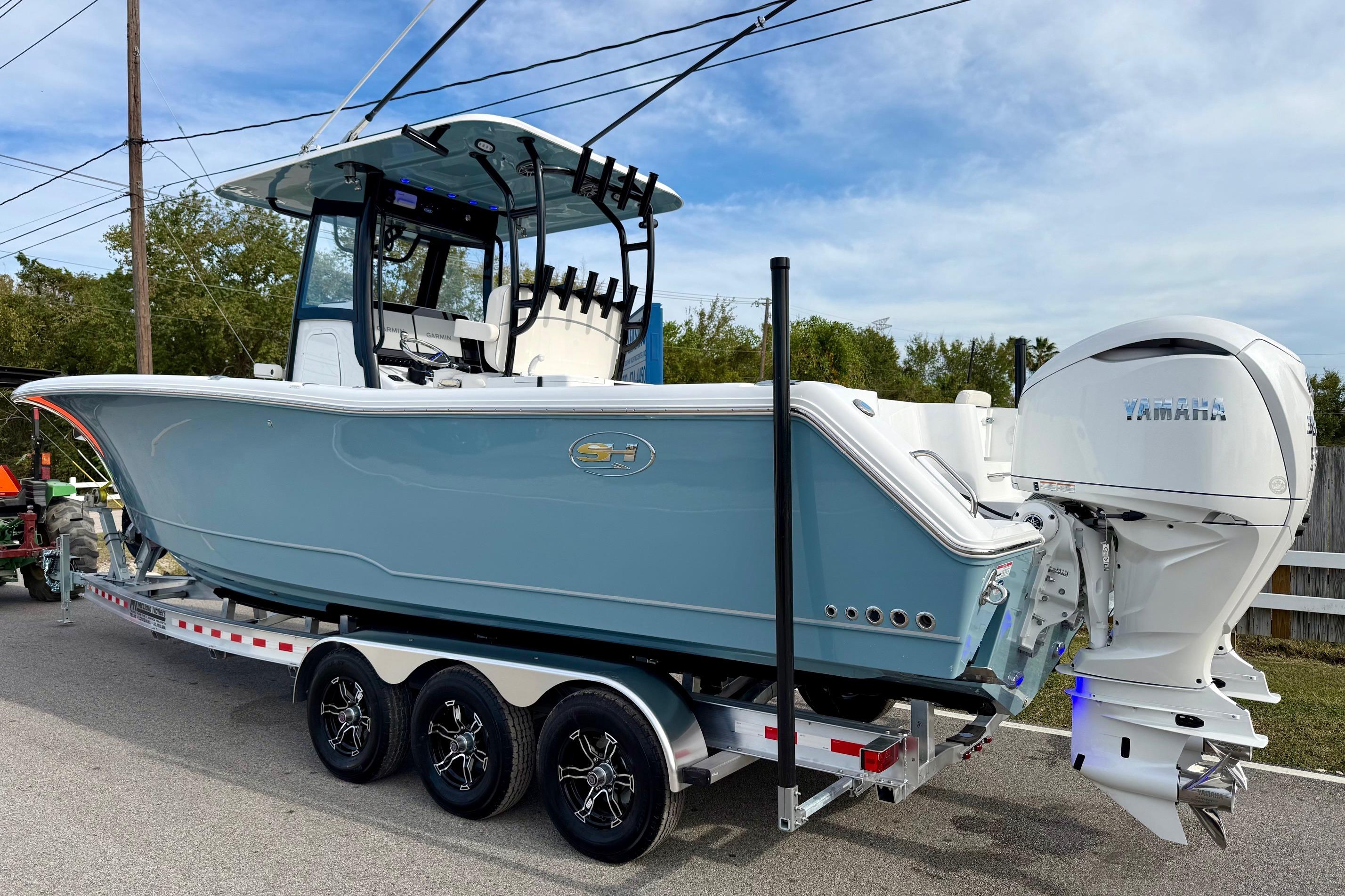 2026 Sea Hunt Gamefish 30 Coffin Box boat on trailer with Yamaha engine.