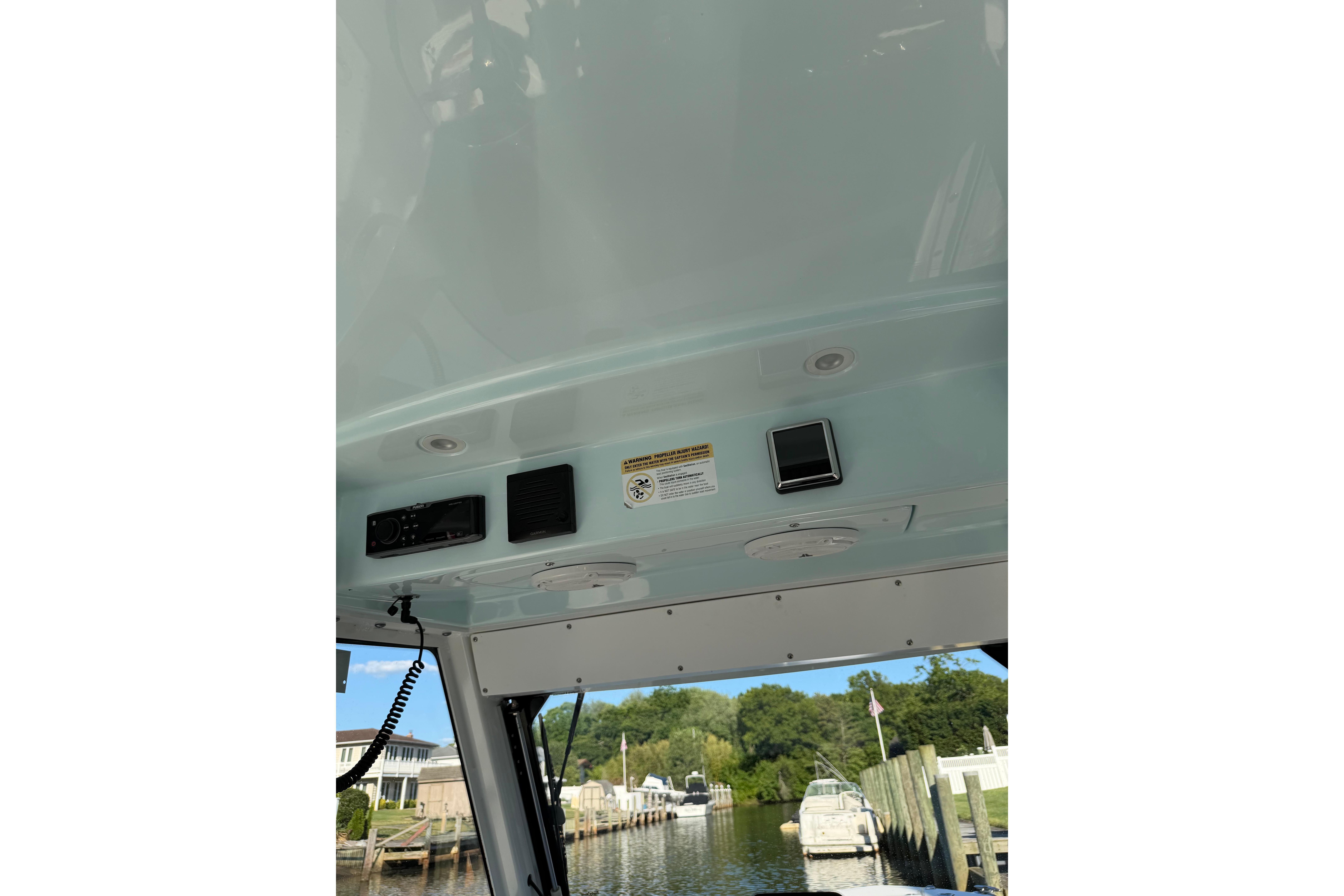 Interior view of 2018 Everglades 335 Center Console boat with electronic controls.