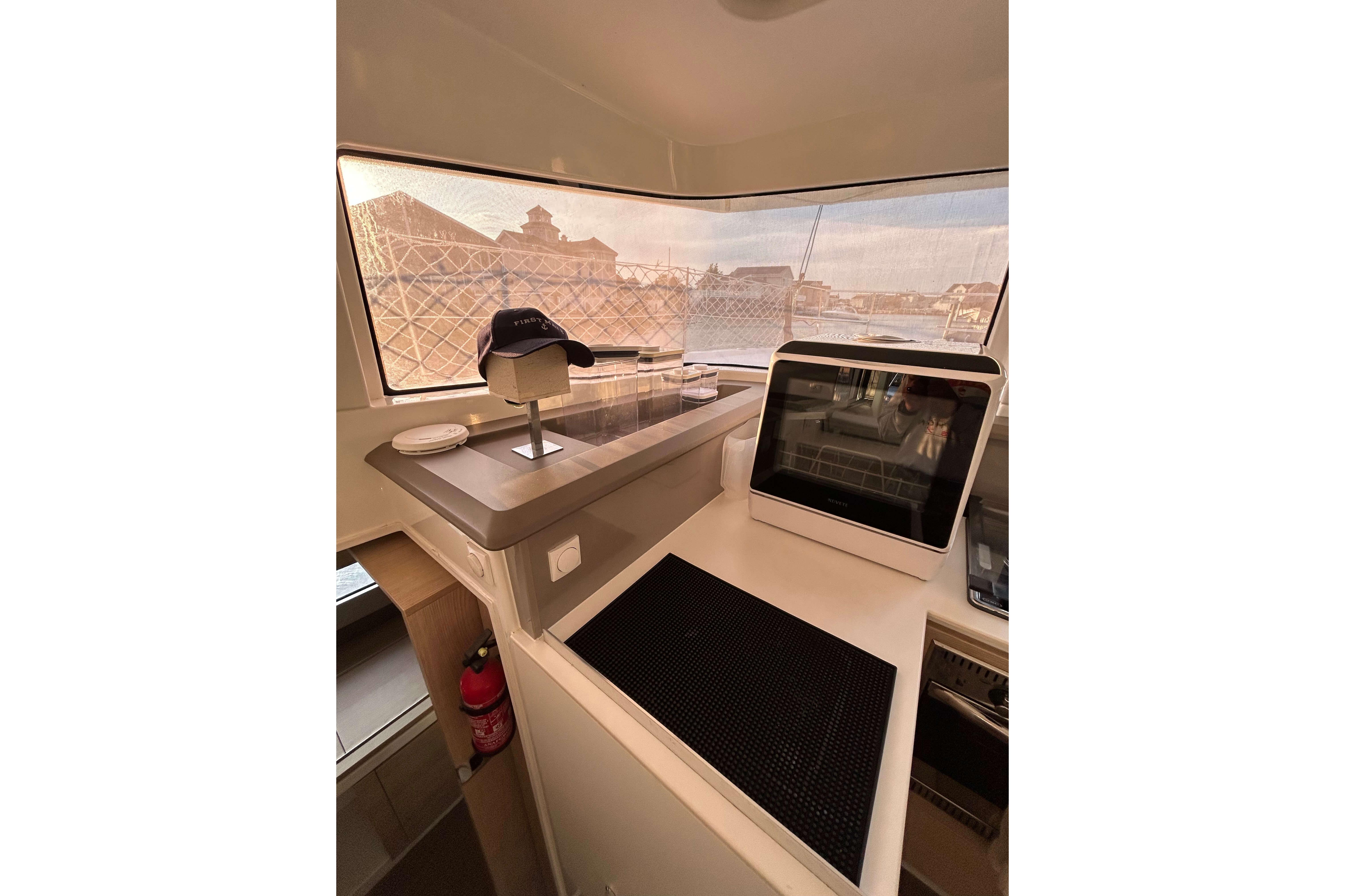 Interior of a 2018 Bali 4.1 yacht with navigation equipment and panoramic windows.
