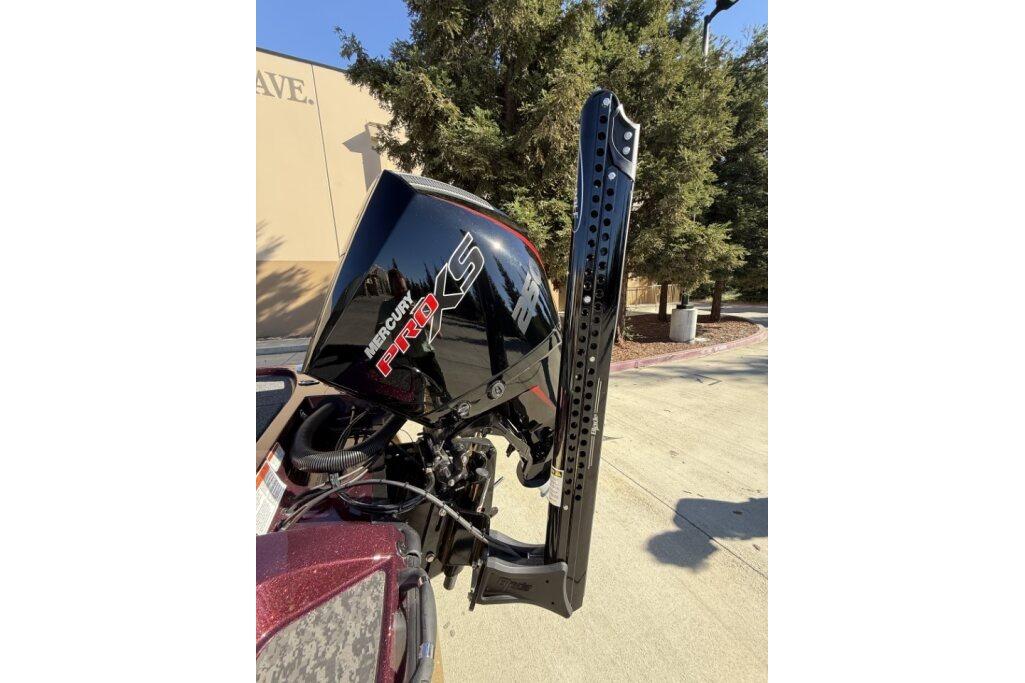 2026 Nitro Z21 XL Pro boat with Mercury Pro XS engine, parked outdoors.