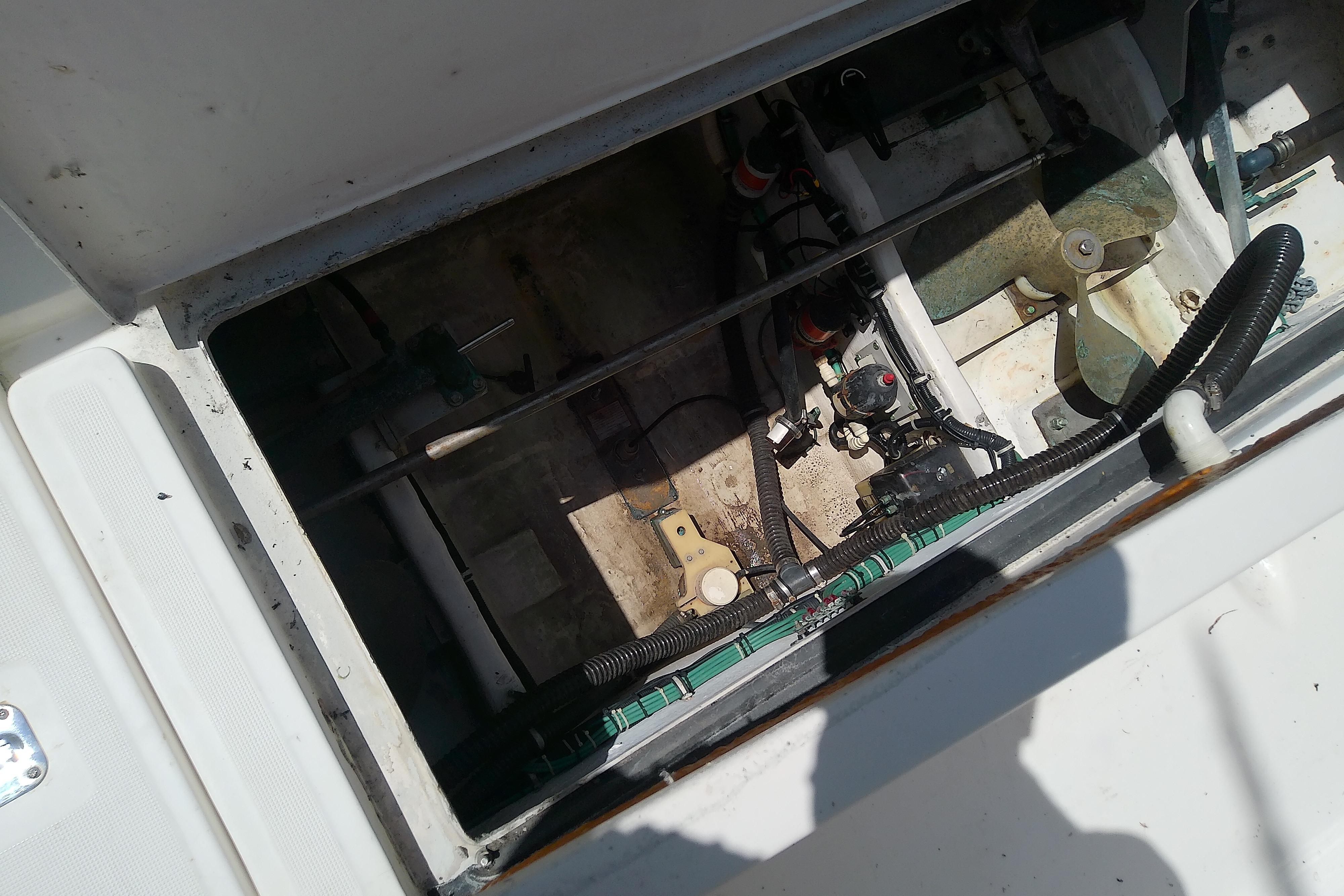 Engine compartment of a 2000 Tiara Yachts 4100 Open, showing mechanical components.