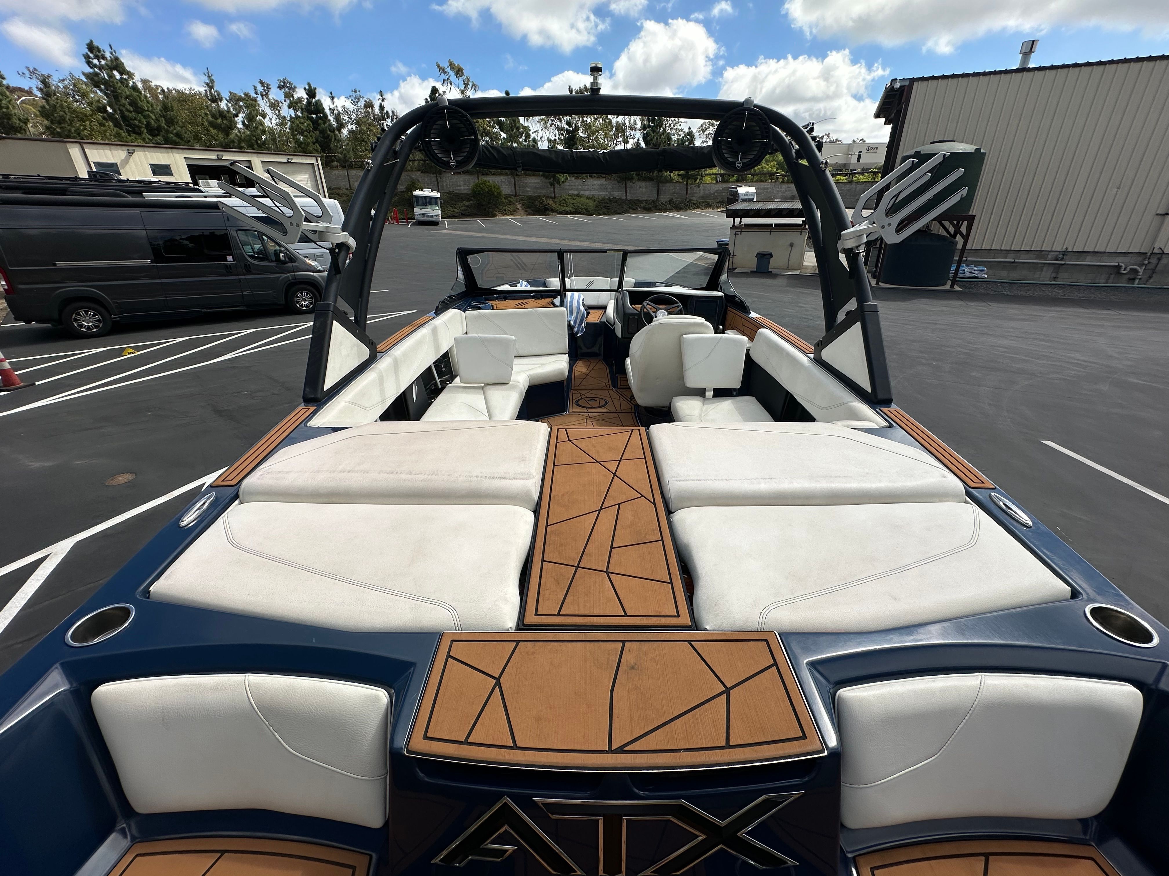 Interior view of a 2021 ATX Surf Boats 22 Type-S in parking lot.