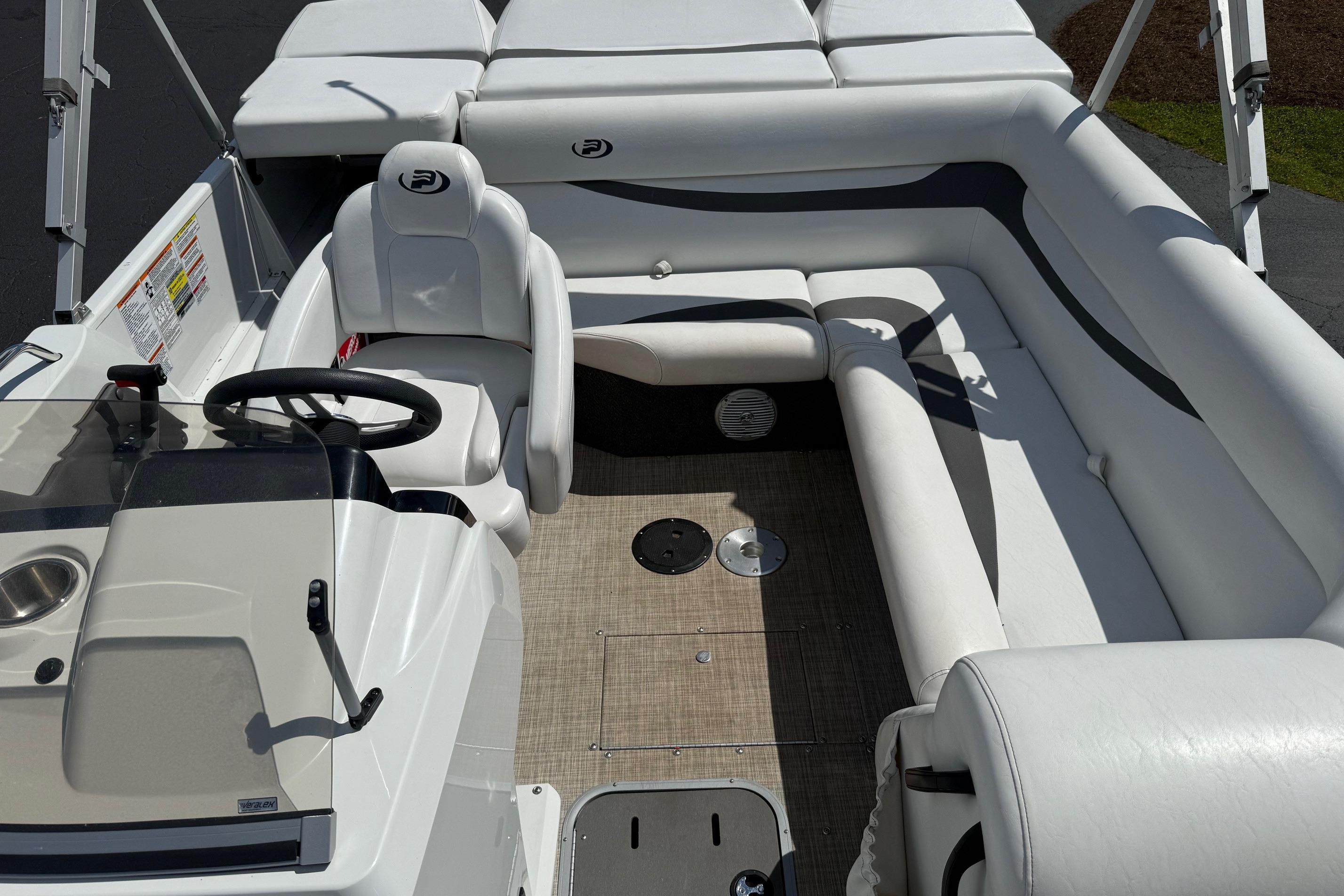 2019 Princecraft Ventura 190 boat interior with white seating and steering console.