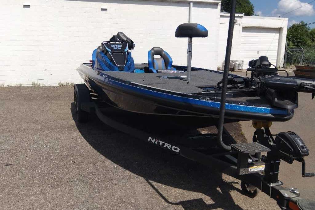 2026 Nitro Z19 XL Pro fishing boat on trailer, parked outdoors.