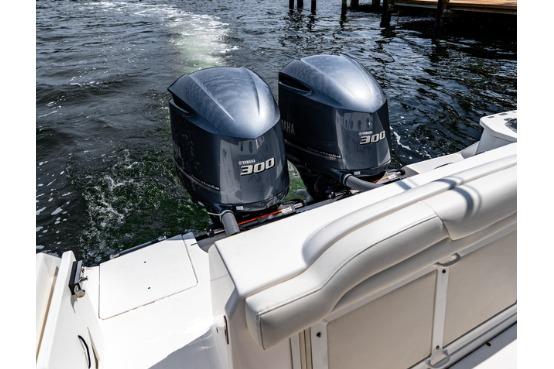 2021 Everglades 295 Center Console with twin 300 horsepower engines on water.