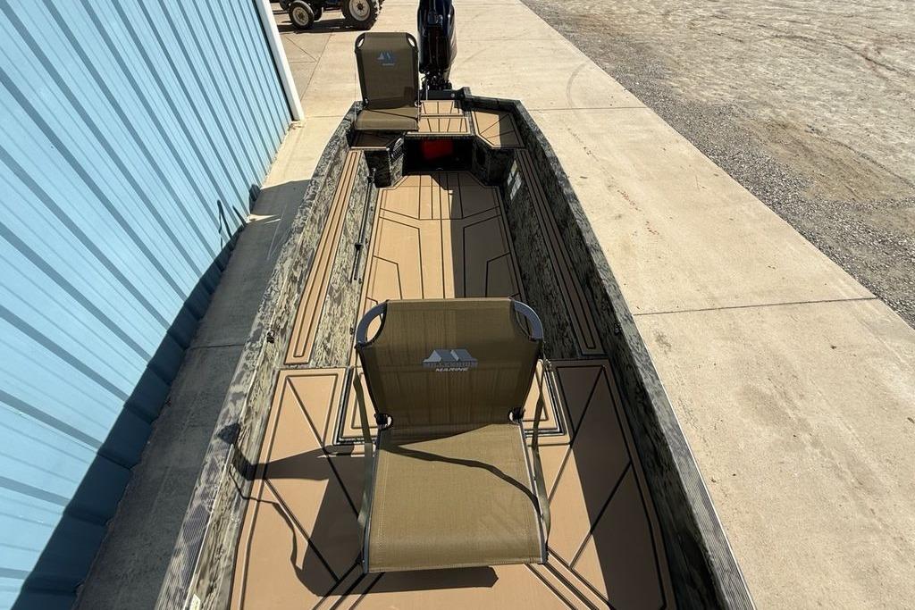 2026 Tracker Grizzly 1650 T Prairie Wings Edition boat with camo design and seating.