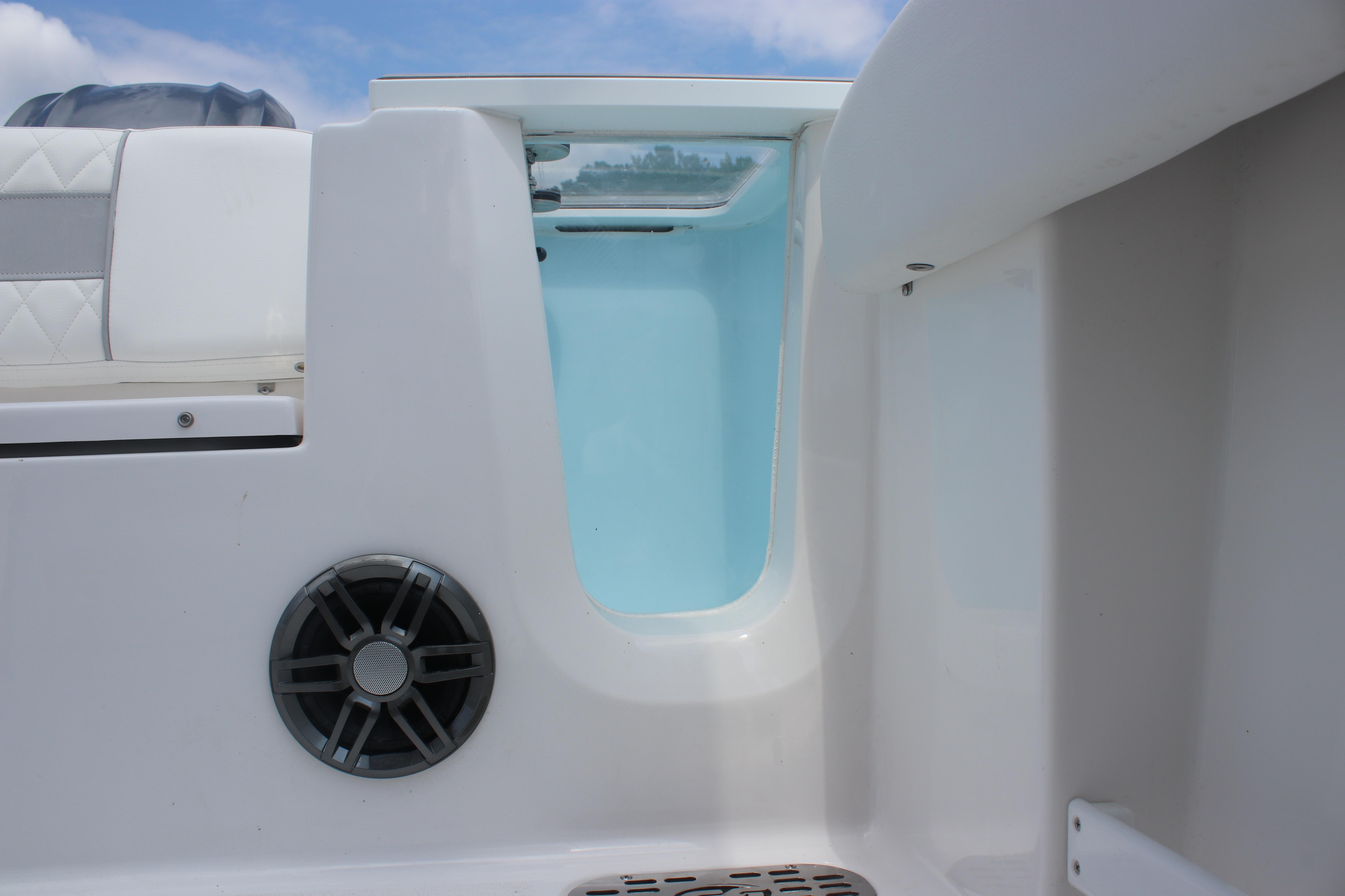 2026 Sea Fox 248 Commander boat interior with speaker and seating detail.