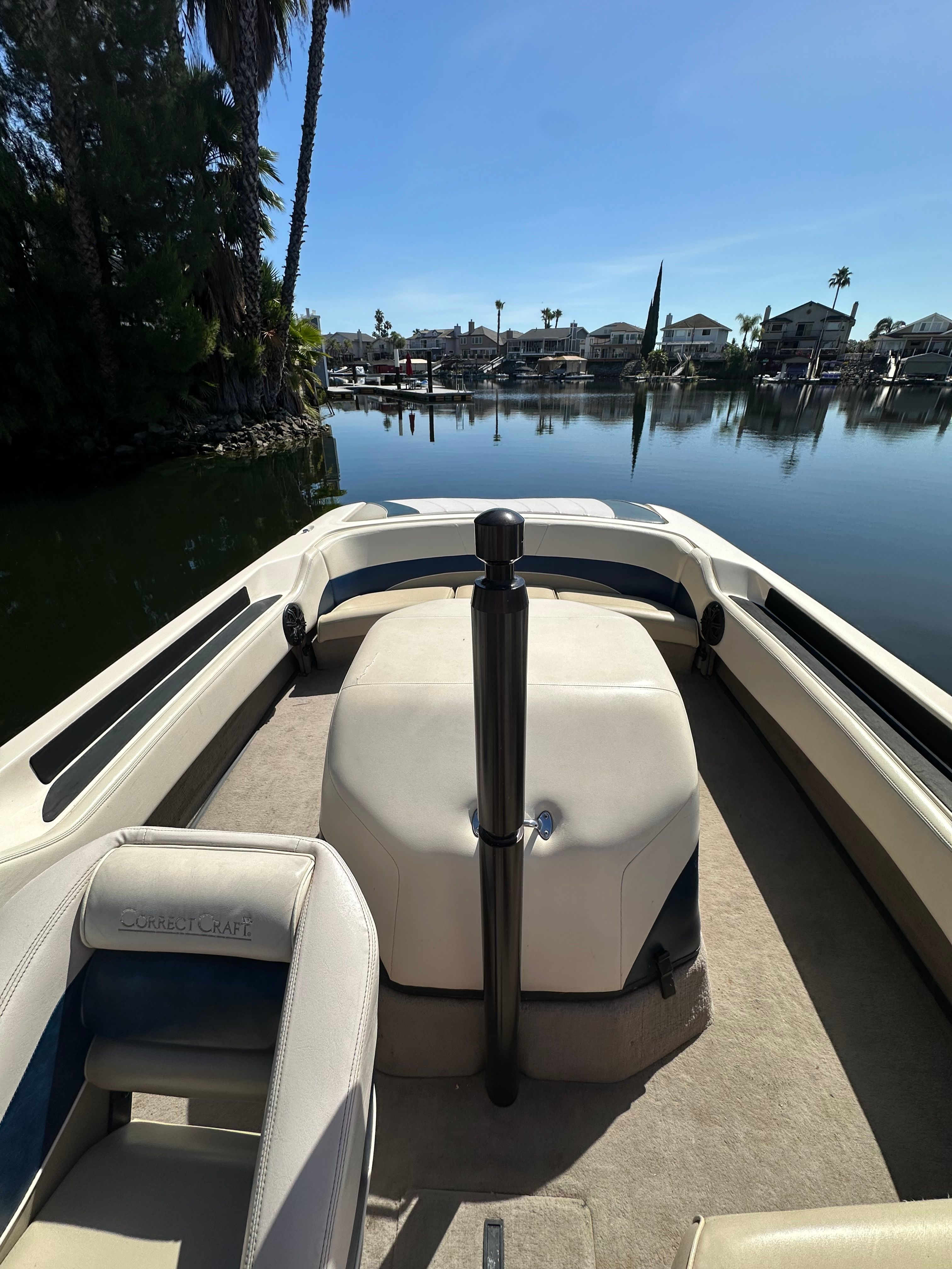 1998 Correct Craft Air Nautique on calm water.