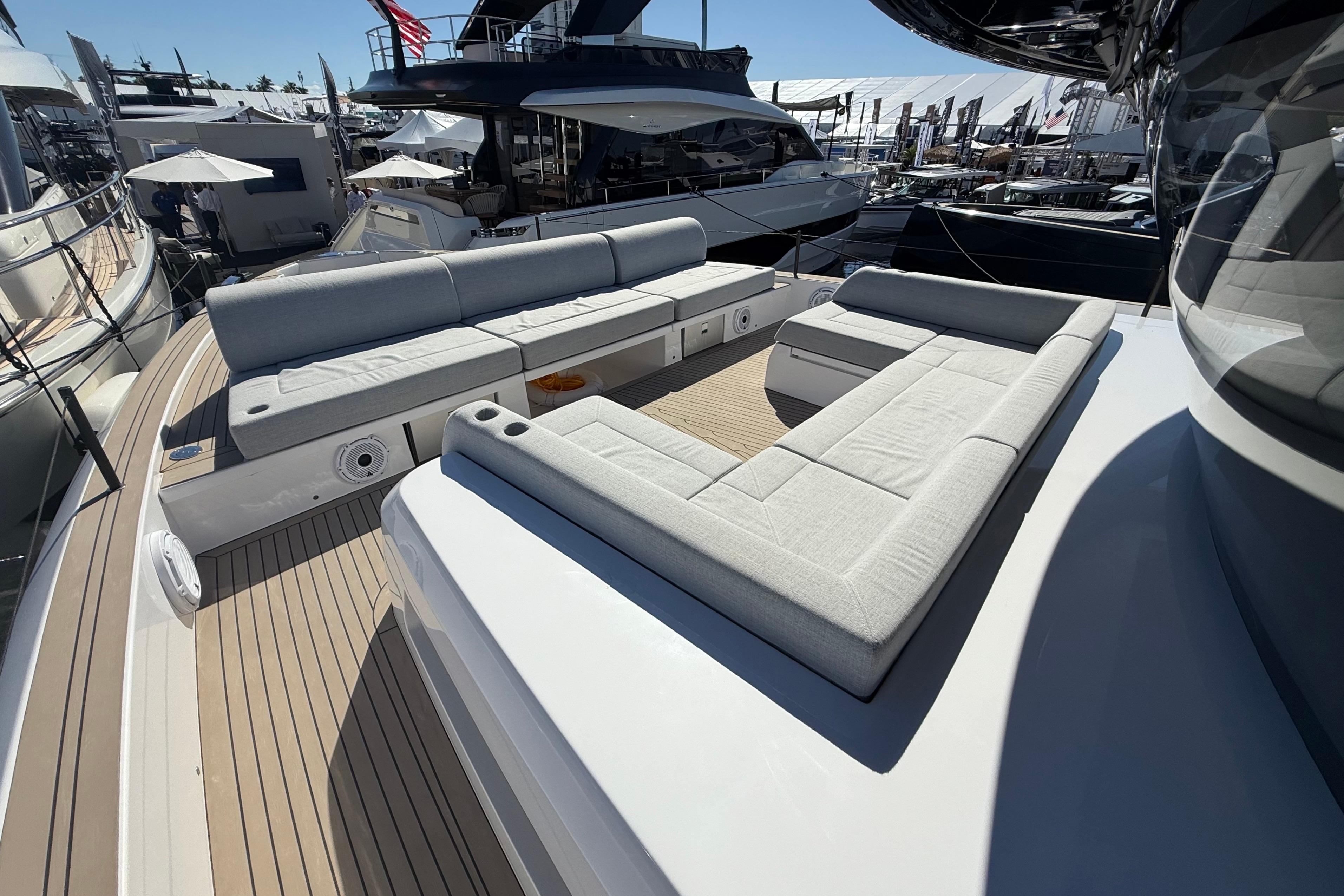 Luxurious 2026 Pardo Yachts GT75 with spacious deck seating at a marina.