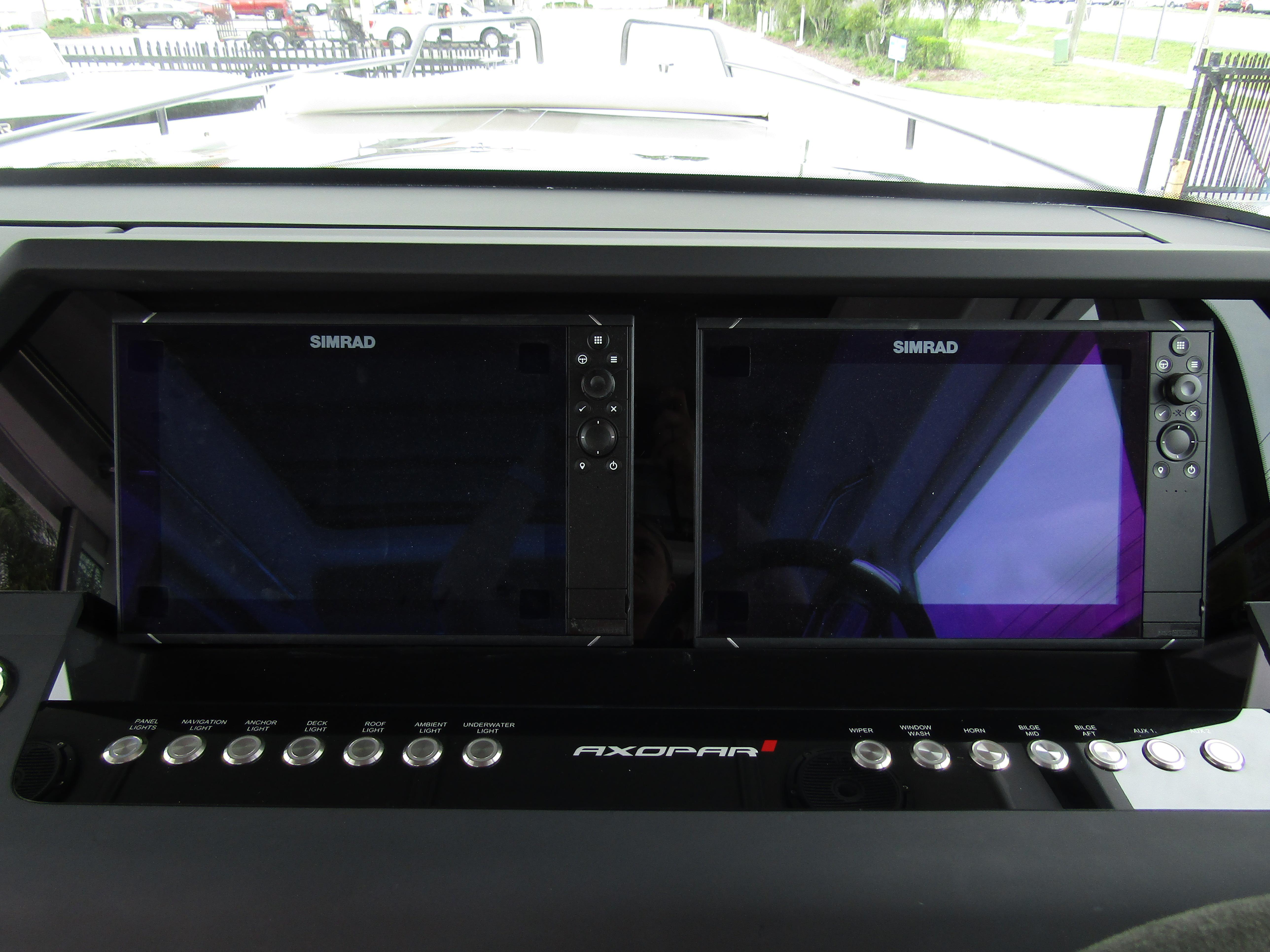 2024 Axopar 37XC CROSS CABIN dashboard with dual Simrad displays.