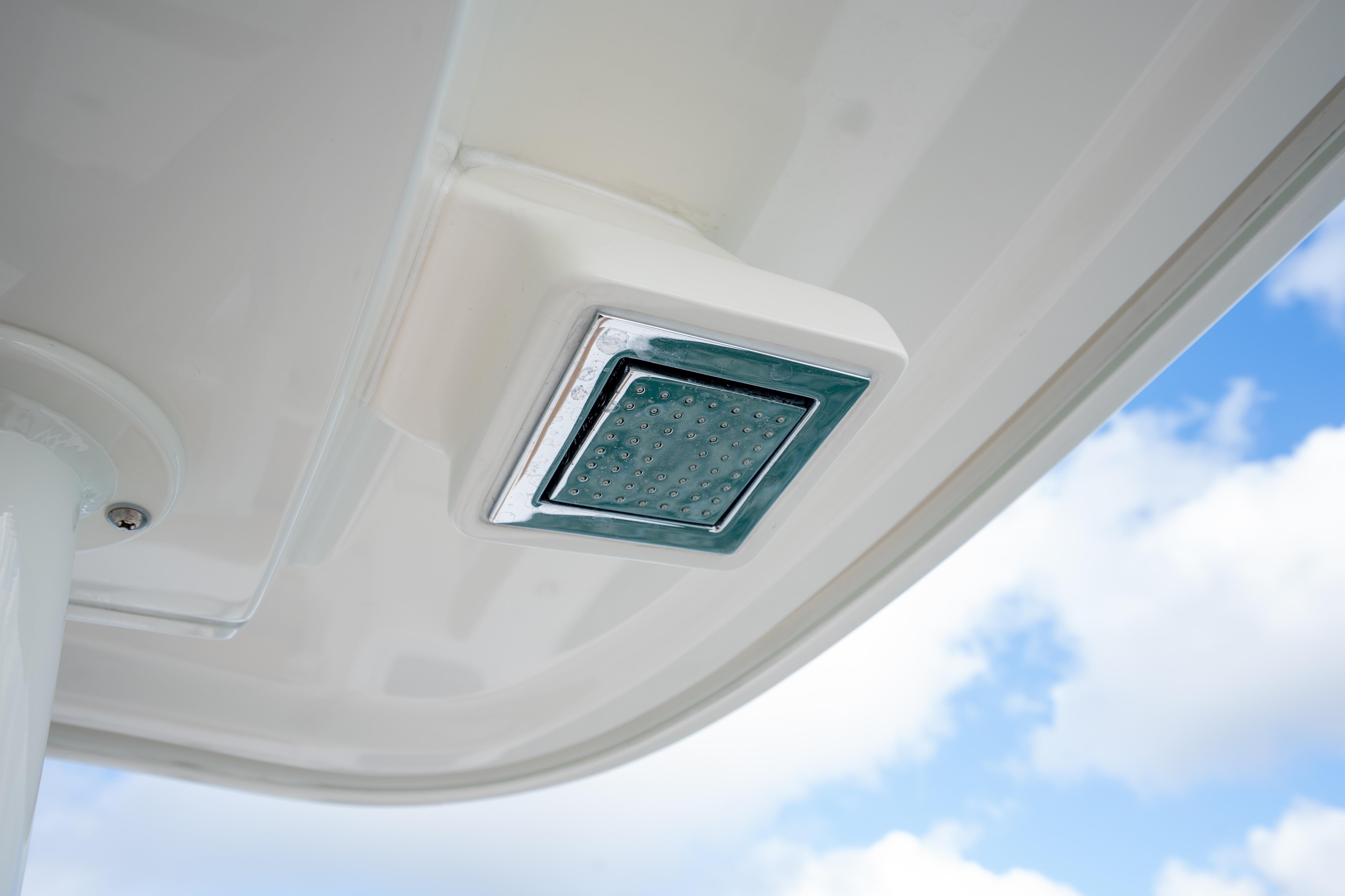 LED light fixture on 2026 Blackwater 41 Performance Fish boat against blue sky.