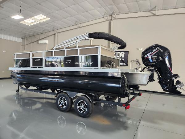 2025 Ranger 200C pontoon boat with Mercury outboard motor in showroom.