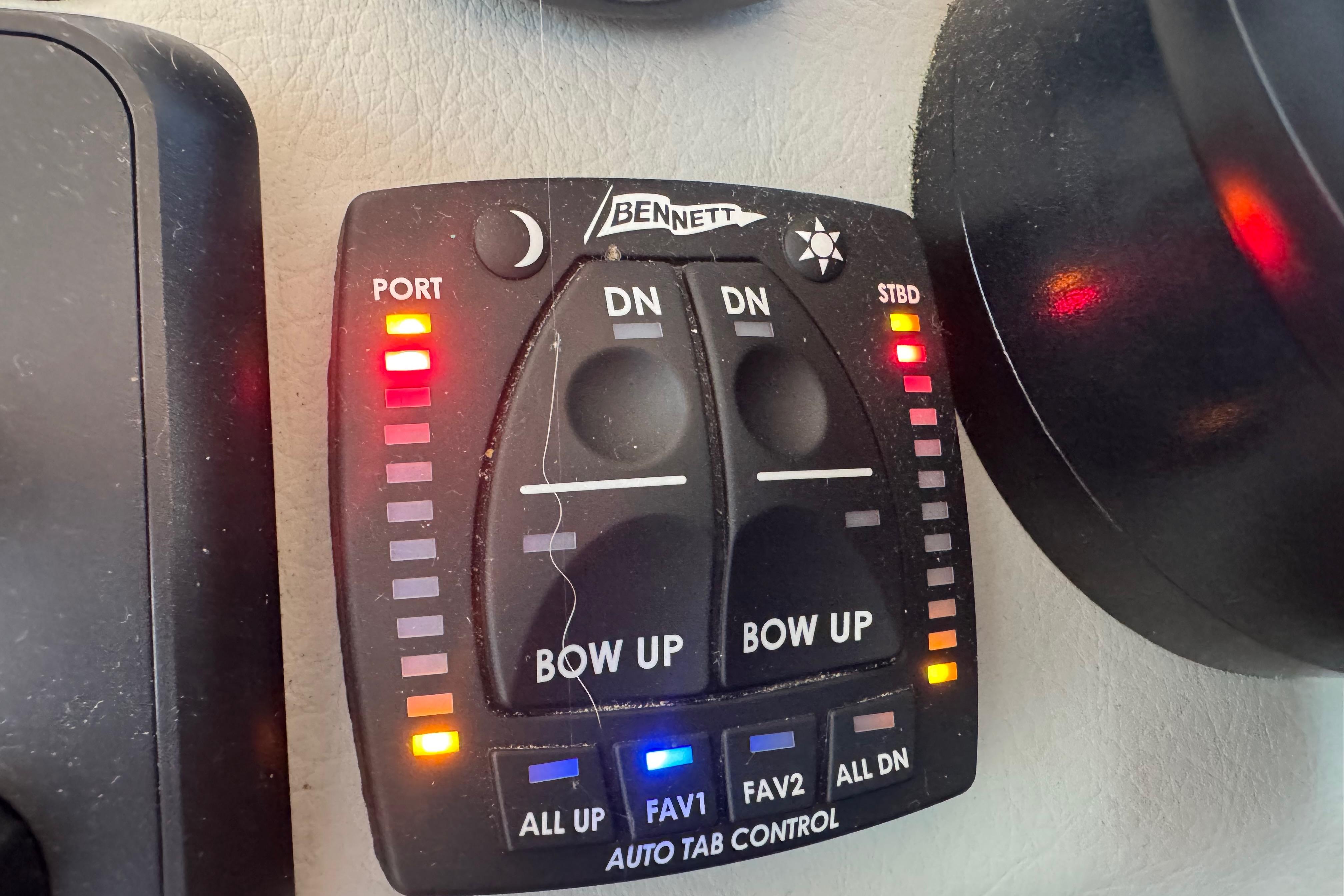 Bennett auto tab control panel on 2019 Regal 42 Fly yacht dashboard.