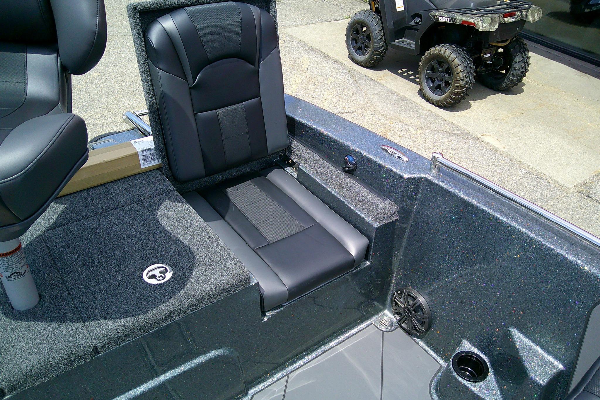 2026 Nitro ZV19 Sport boat interior with black seating and storage compartments.