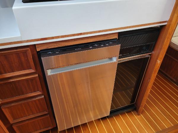 Interior of a 1980 Hatteras 53 Yacht Fisherman featuring a modern kitchen.