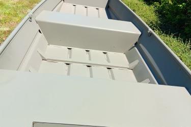 2026 Tracker Grizzly 14 Jon boat interior with bench seating and durable construction.