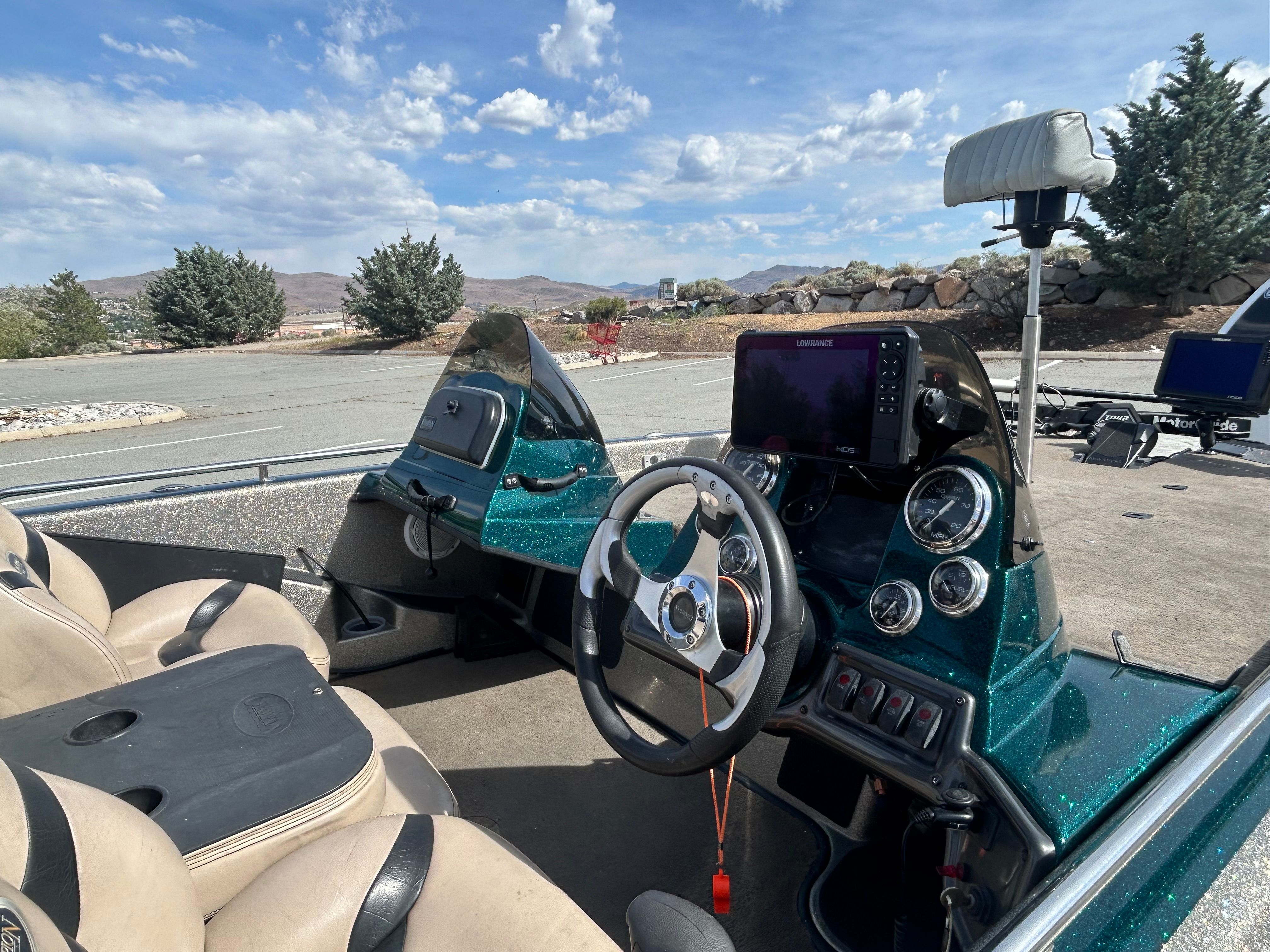 Interior view of a 2008 Champion 183 boat with steering console.