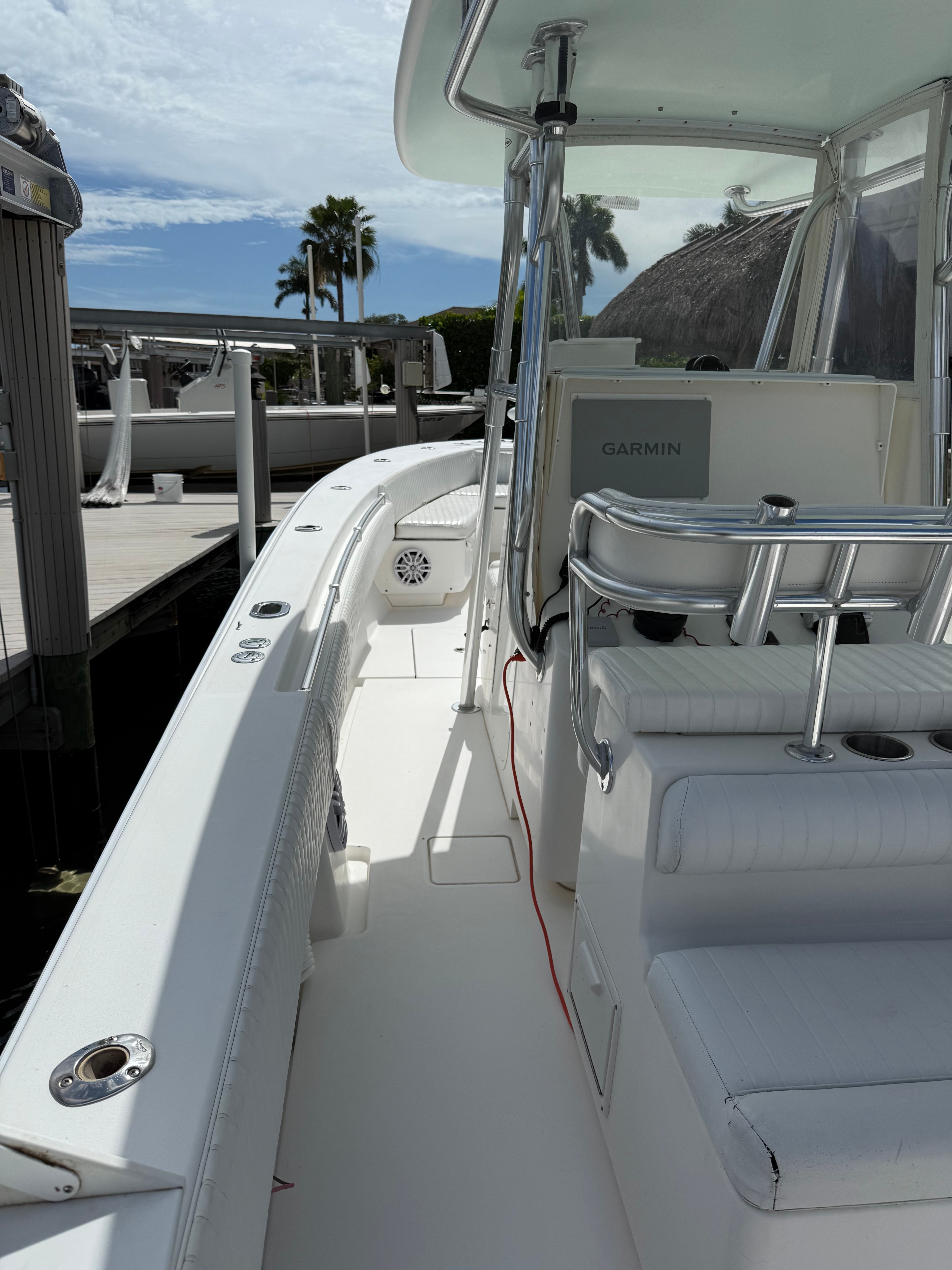 2012 Contender 32 ST boat with Garmin equipment at dock.