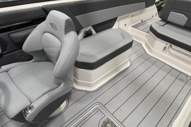 Interior of 2026 Chaparral SSX 8 boat with gray seating and flooring.