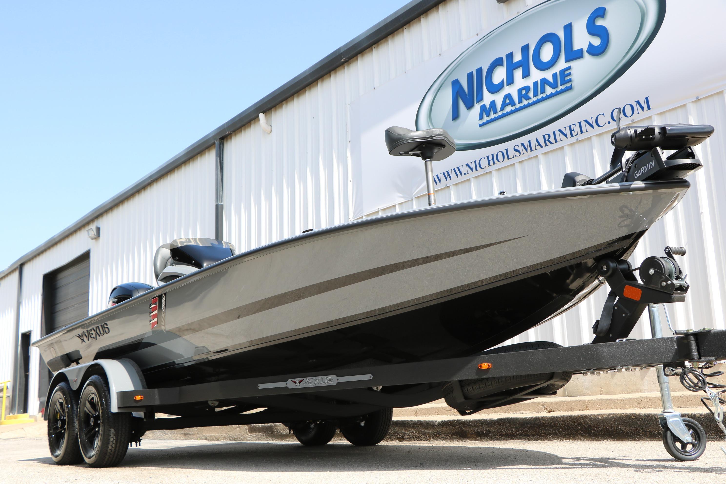 2026 Vexus AVX1980 boat at Nichols Marine dealership, featuring sleek design and advanced Garmin equipment.