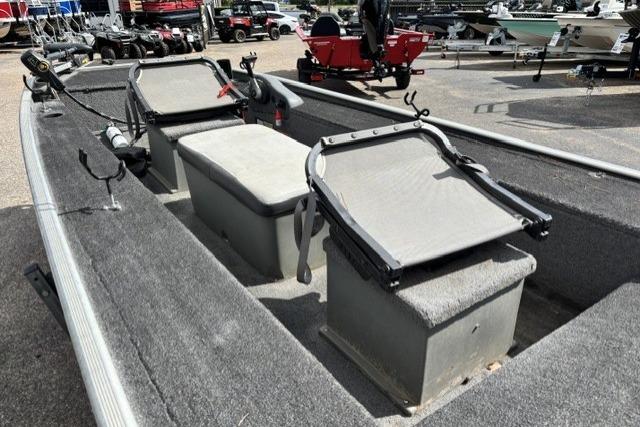 2015 Tracker Panfish 16 boat interior with seating and fishing rod holders.