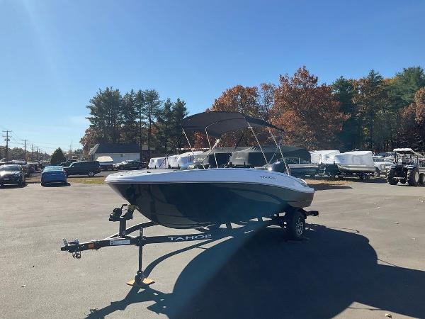 2025 Tahoe T18 boat on trailer in sunny outdoor setting.