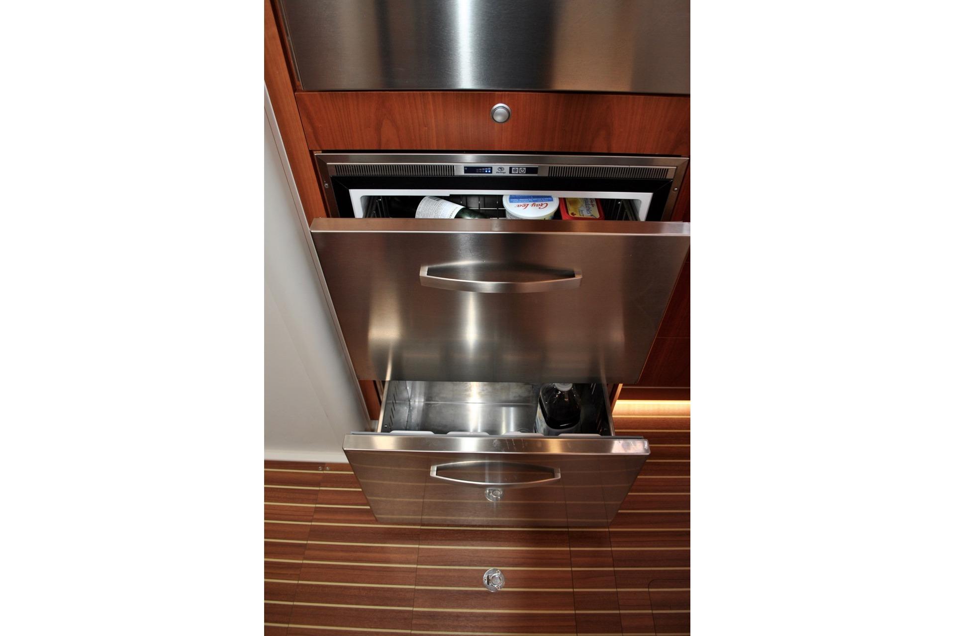 Stainless steel drawers in 2017 Hanse 505 yacht kitchen interior.