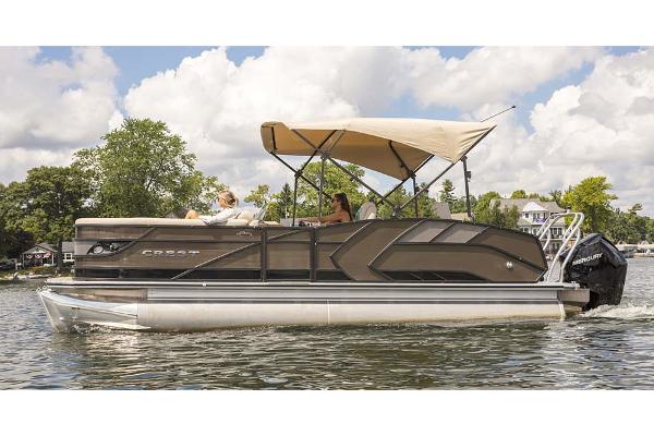 Manufacturer Provided Image: 2021 Crest Caribbean LX 250 SLS pontoon boat cruising on a lake.