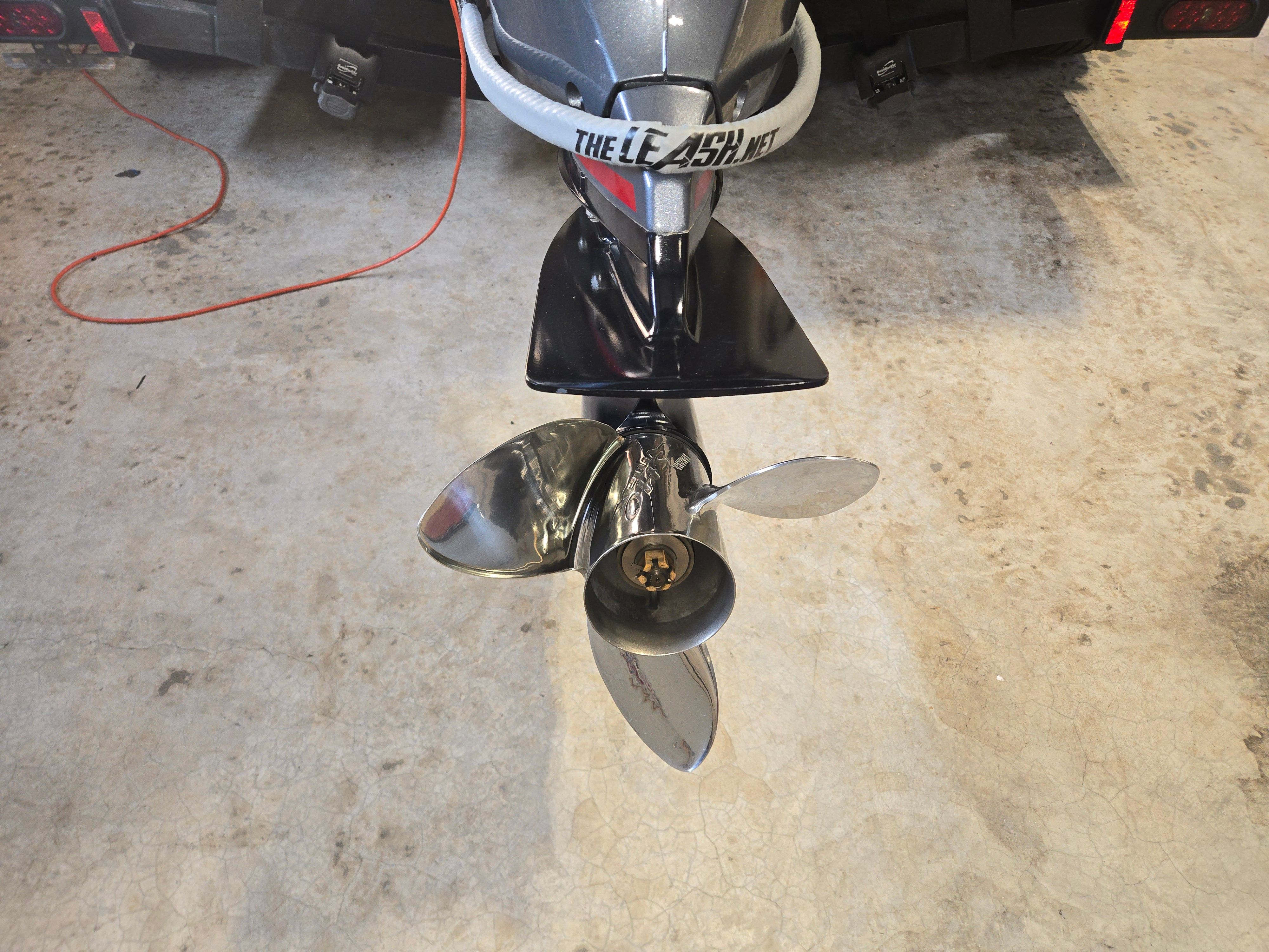 Close-up of a shiny propeller on a 2022 Caymas CX 19 boat.