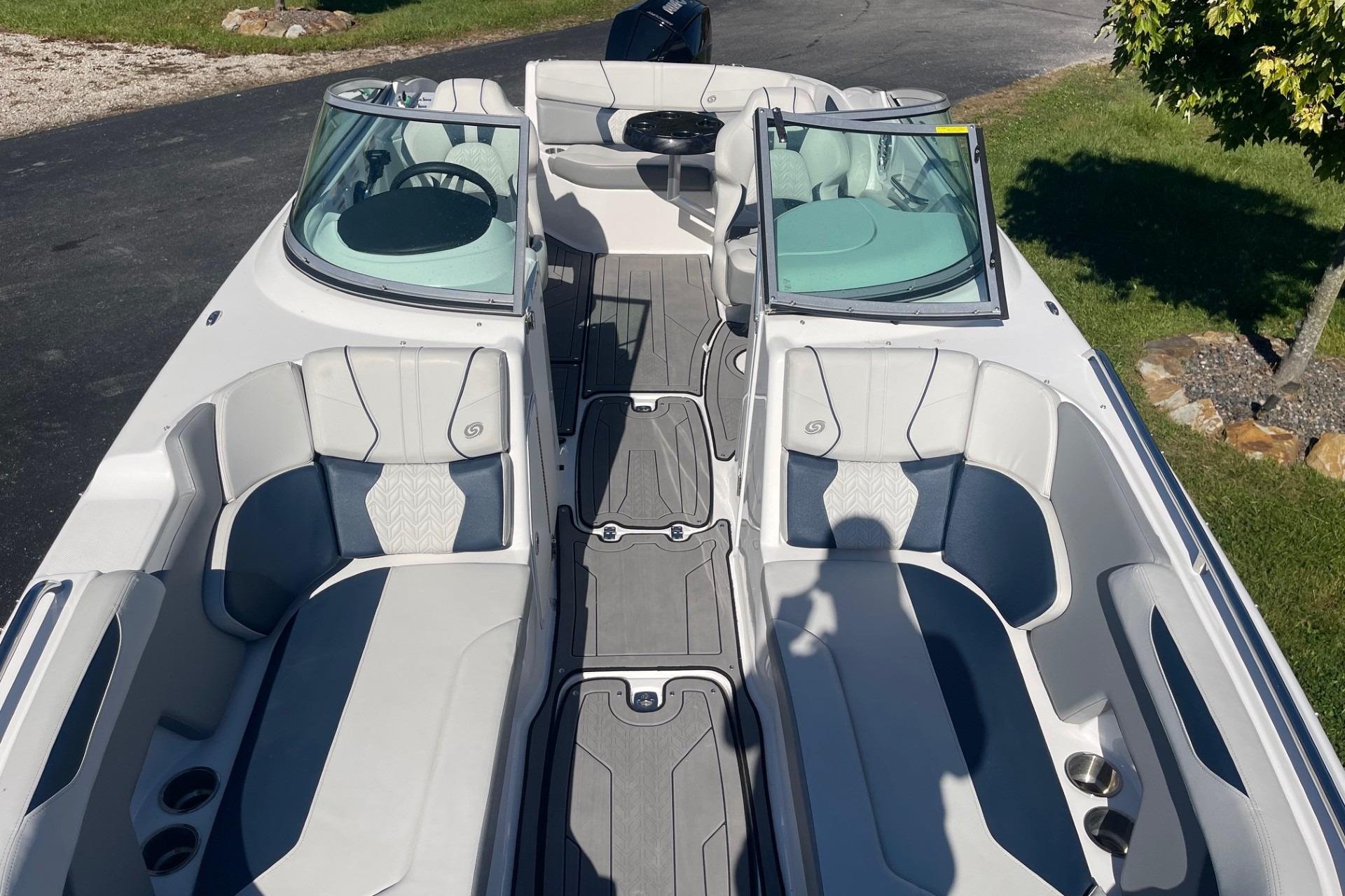 2023 Hurricane SunDeck 2400 OB boat interior with spacious seating and modern design.