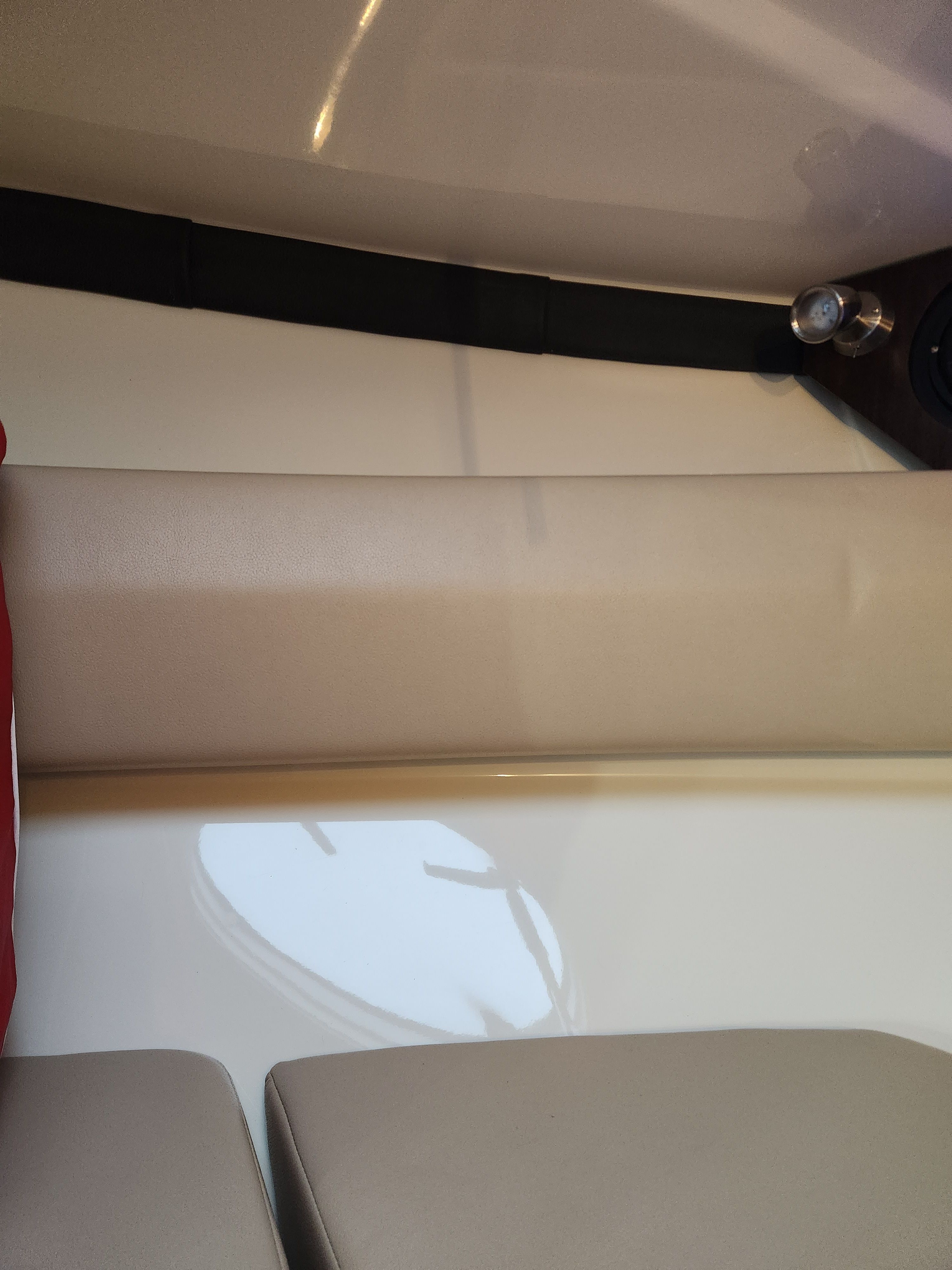 Interior of a 2015 Monterey 268SSC boat with seating cushion.