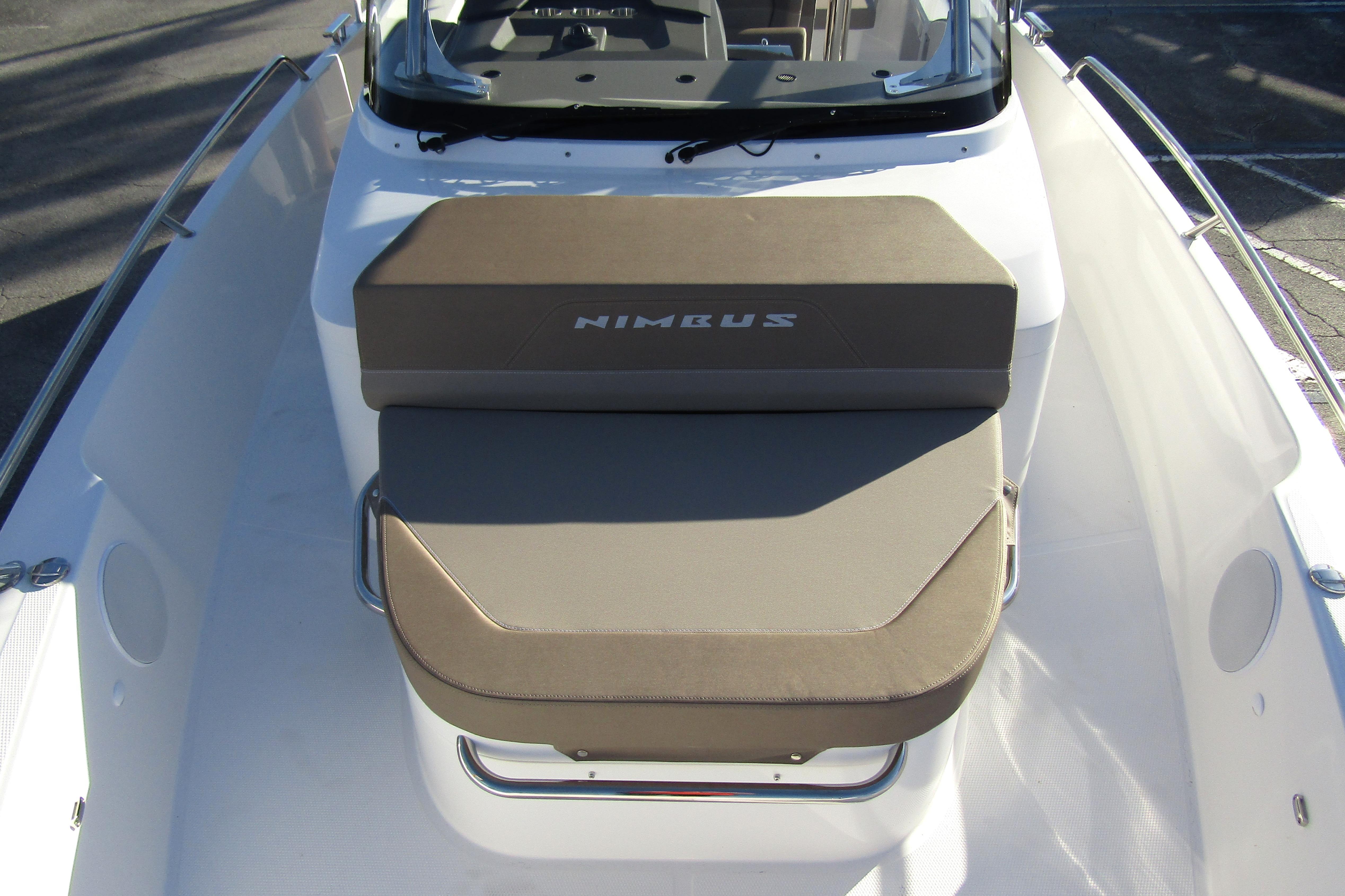 2025 Nimbus Tender 9 boat with cushioned seating and sleek design.