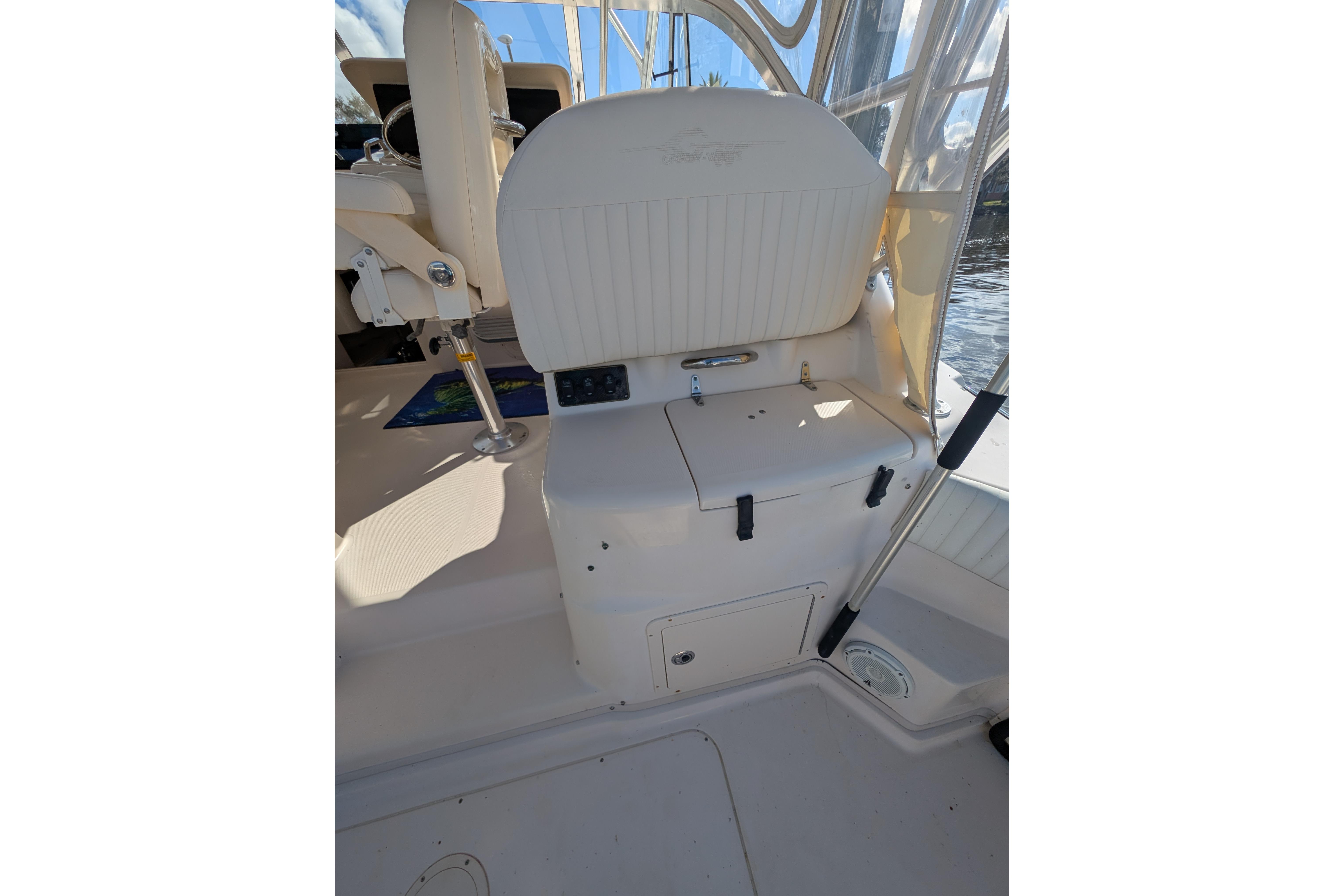 2010 Grady-White Express 330 boat interior with seating and storage compartments.
