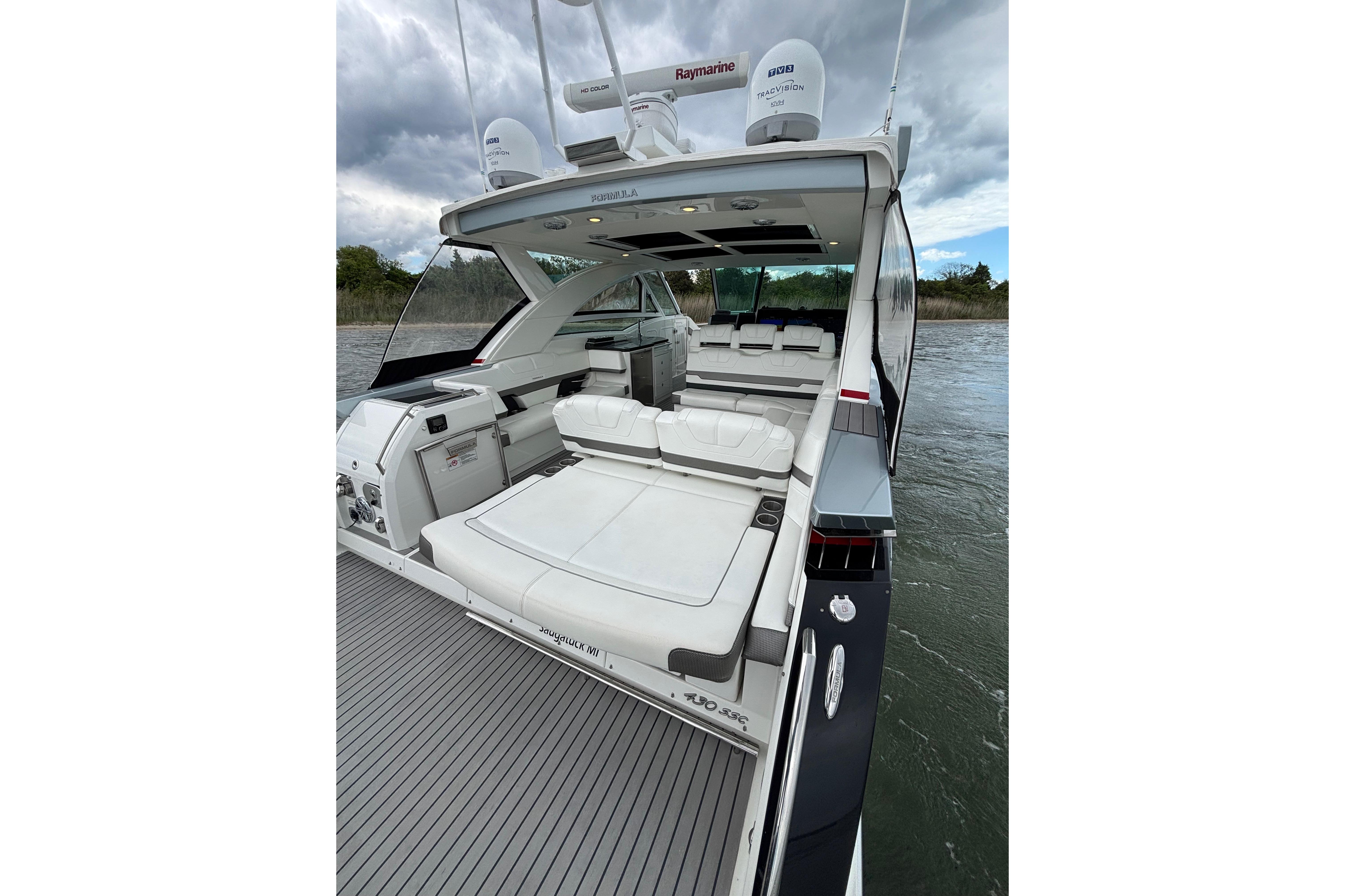 2017 Formula 430 Super Sport Crossover yacht with spacious deck and luxurious seating.