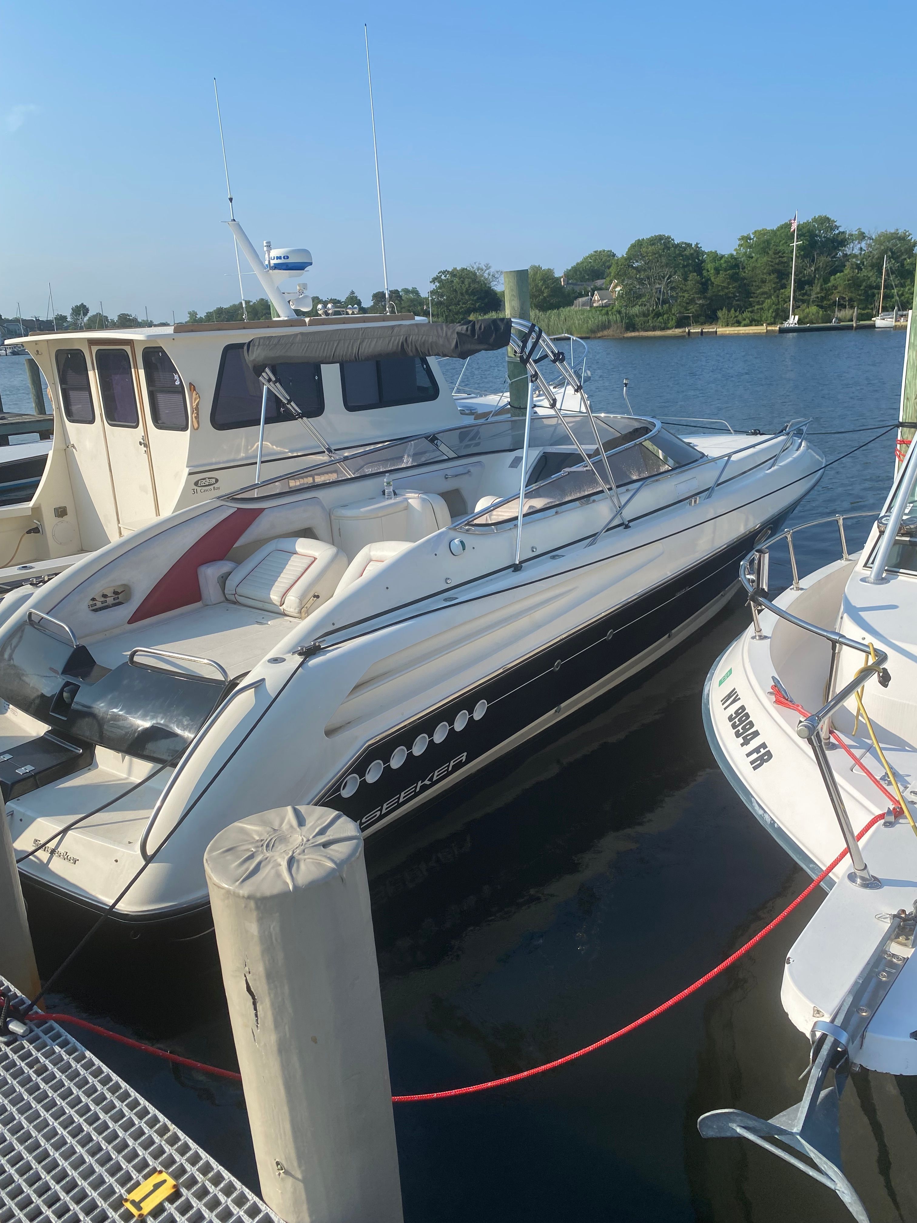 1994 Sunseeker Hawk 31 docked at marina.