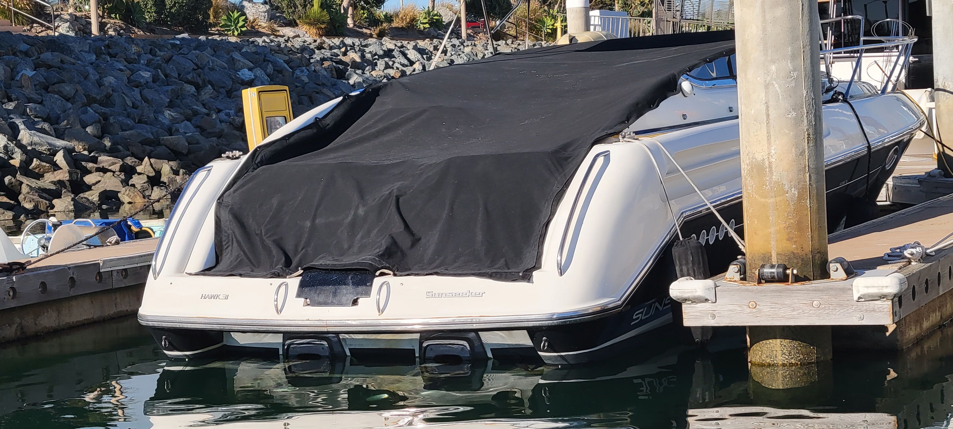 1994 Sunseeker Hawk 31 docked at marina.