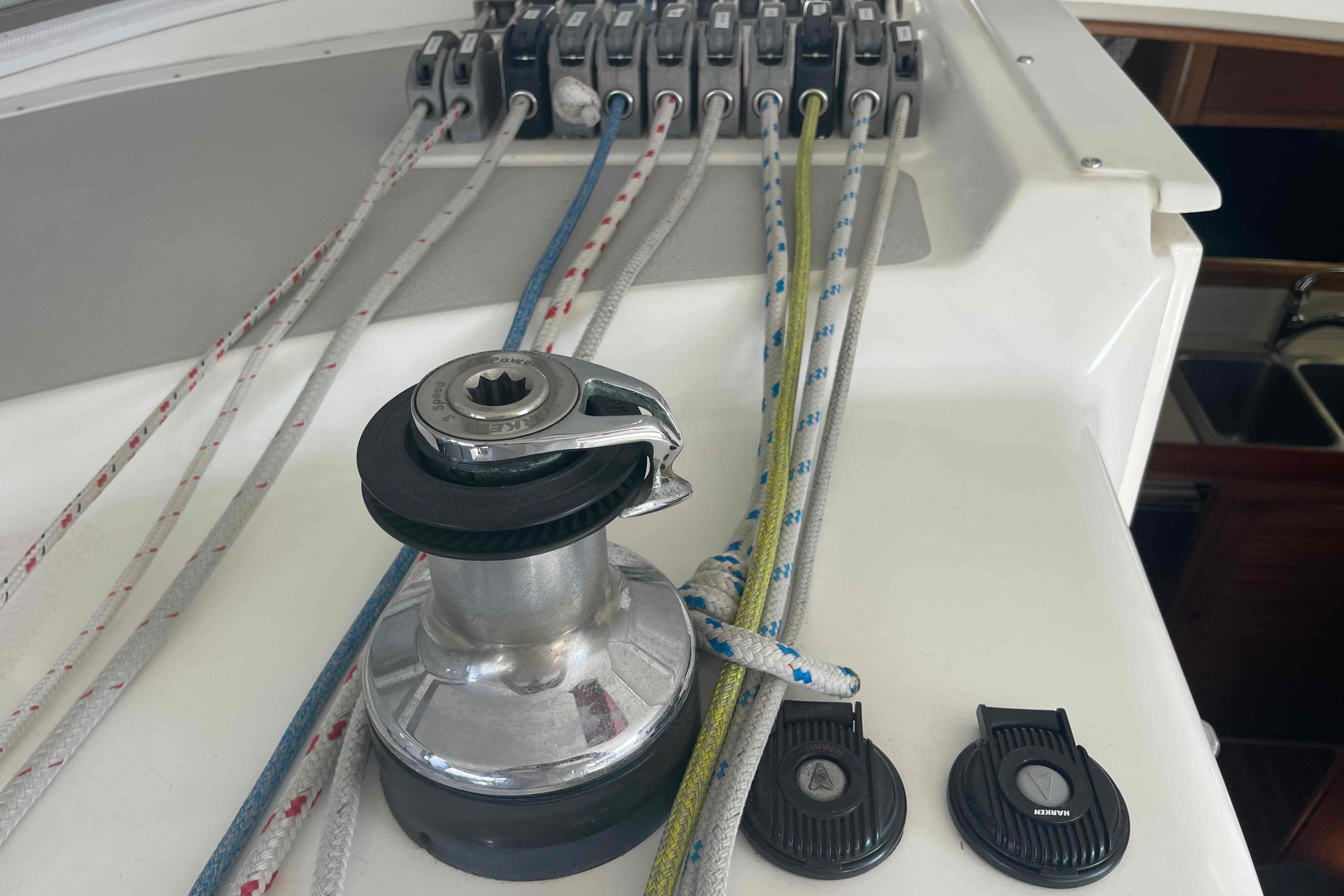 Winch and ropes on a 2013 Catalina Morgan 440 sailboat deck.