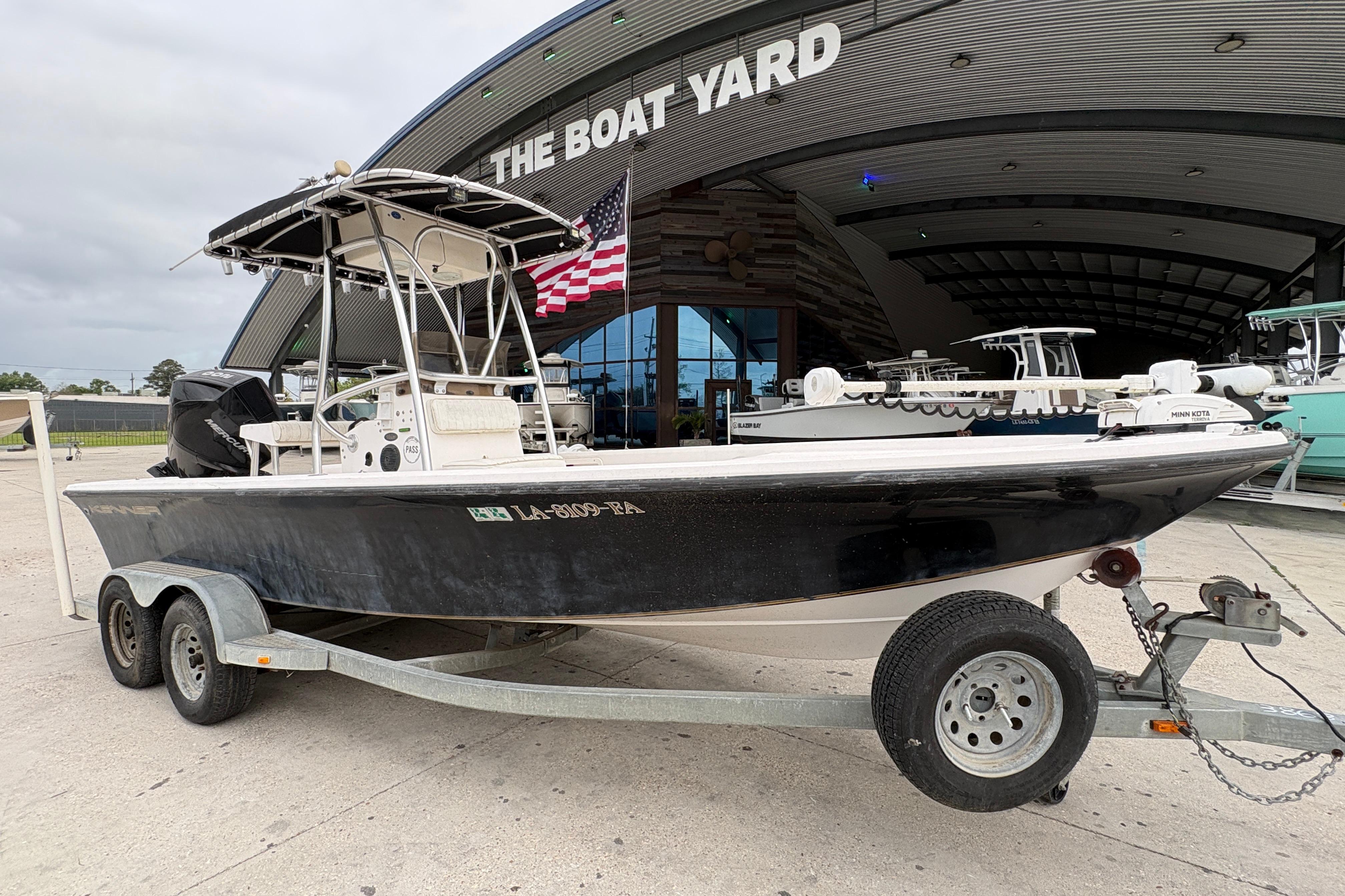 Kenner 21 VISION 2000 boat on trailer at The Boat Yard dealership.