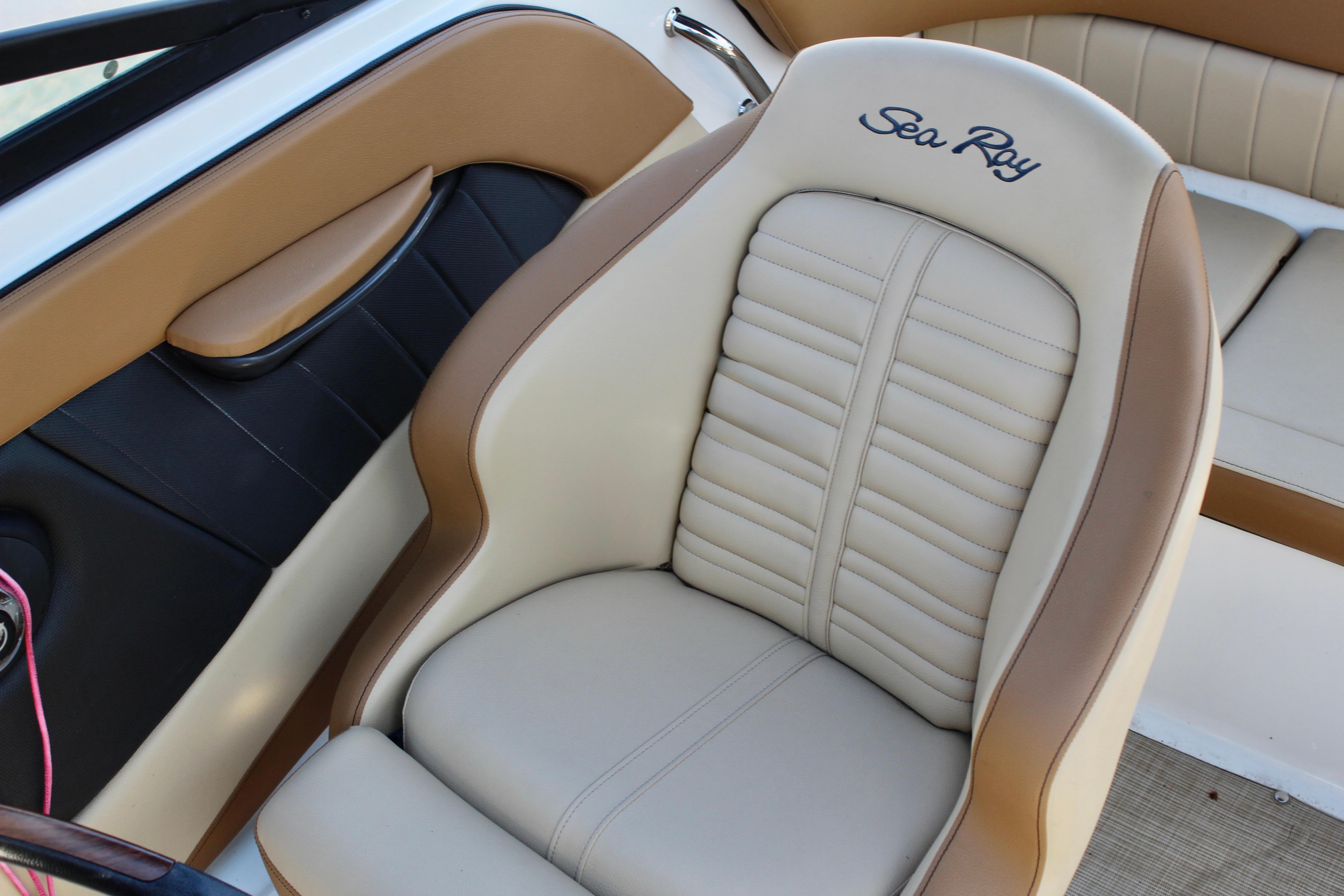 2018 Sea Ray SPX 190 Outboard boat seat with beige and brown upholstery.