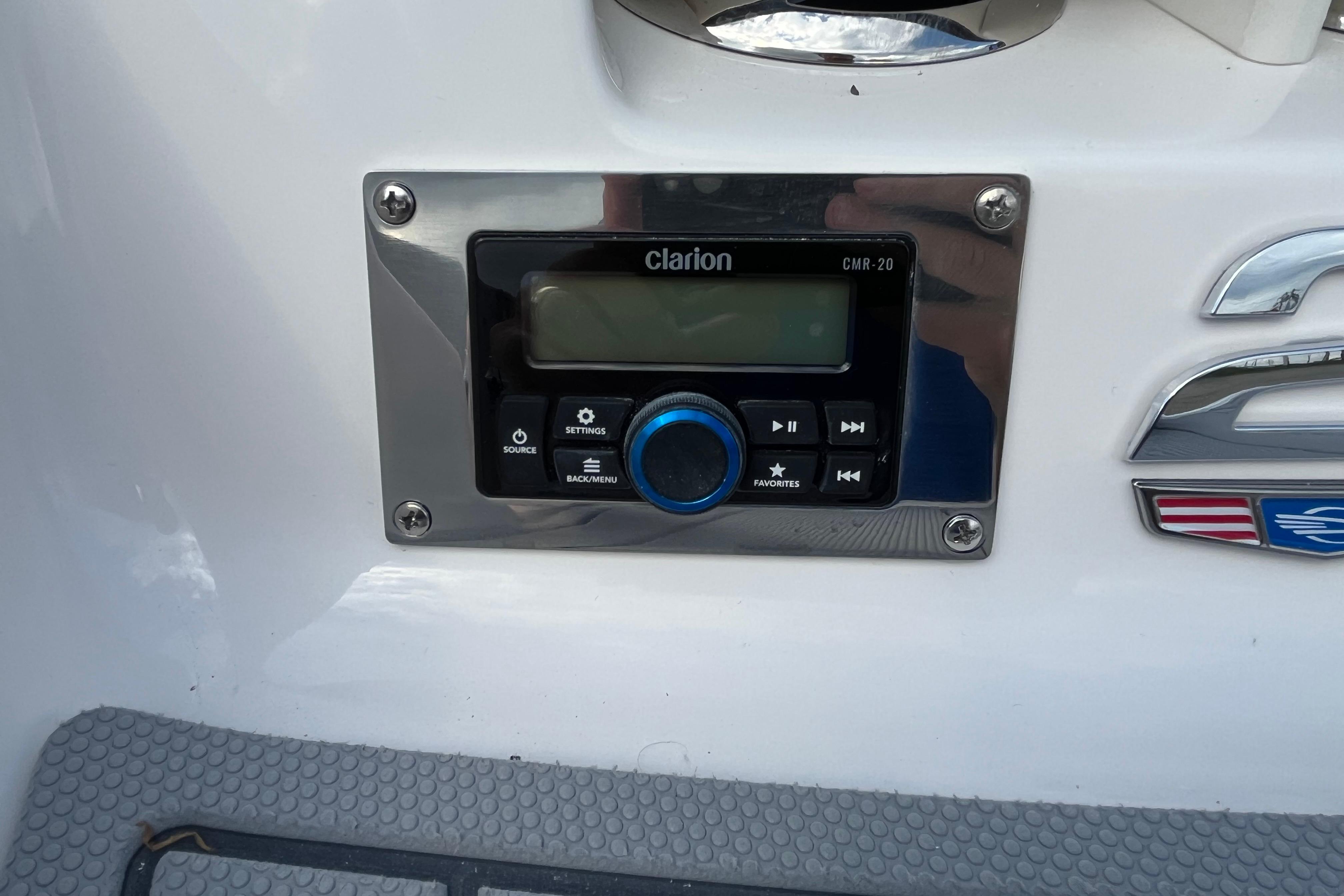 Clarion CMR-20 audio system on 2026 Chaparral 21 SSi boat dashboard.