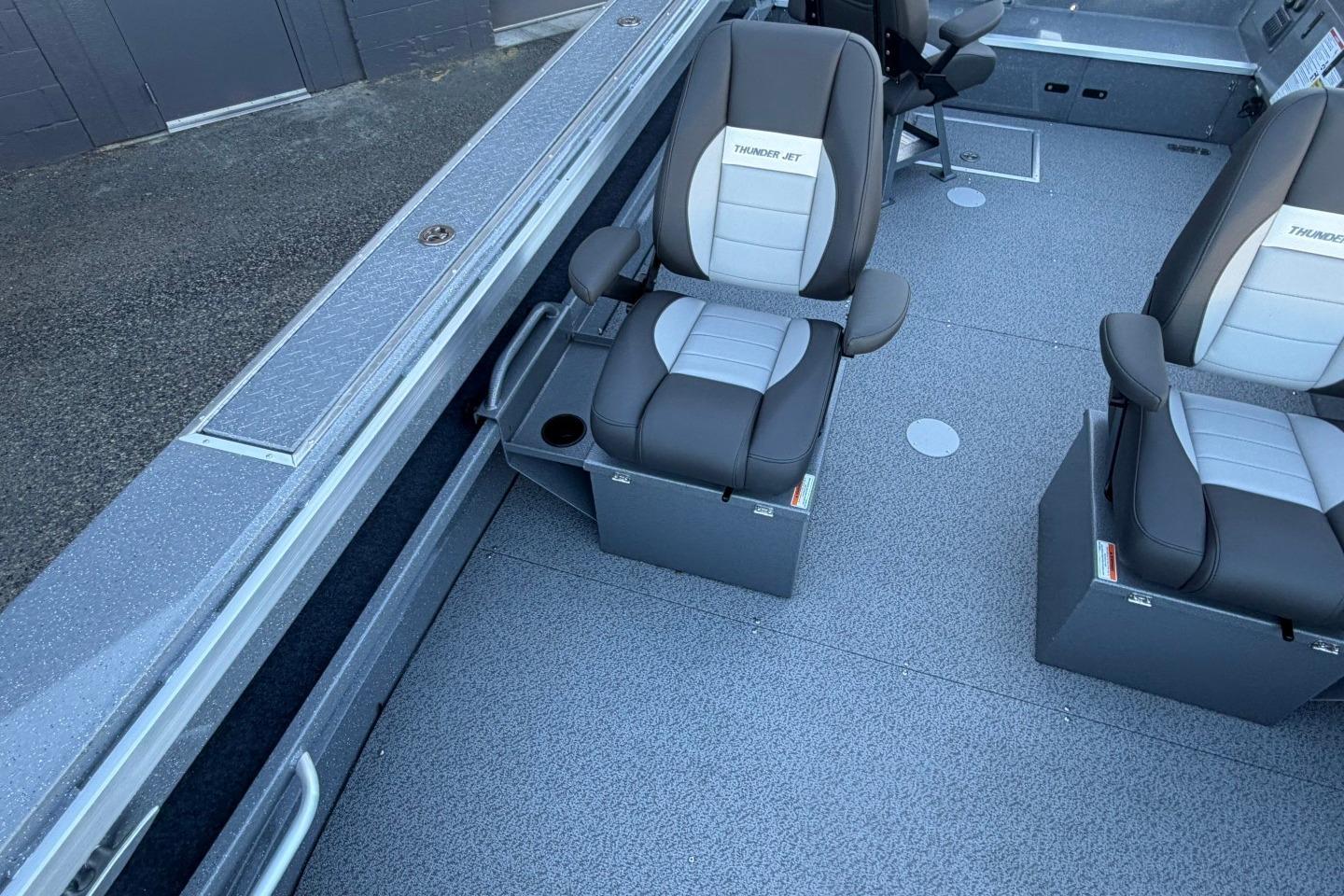 Interior of 2026 Thunder Jet 209 Rush OT boat with comfortable seating.