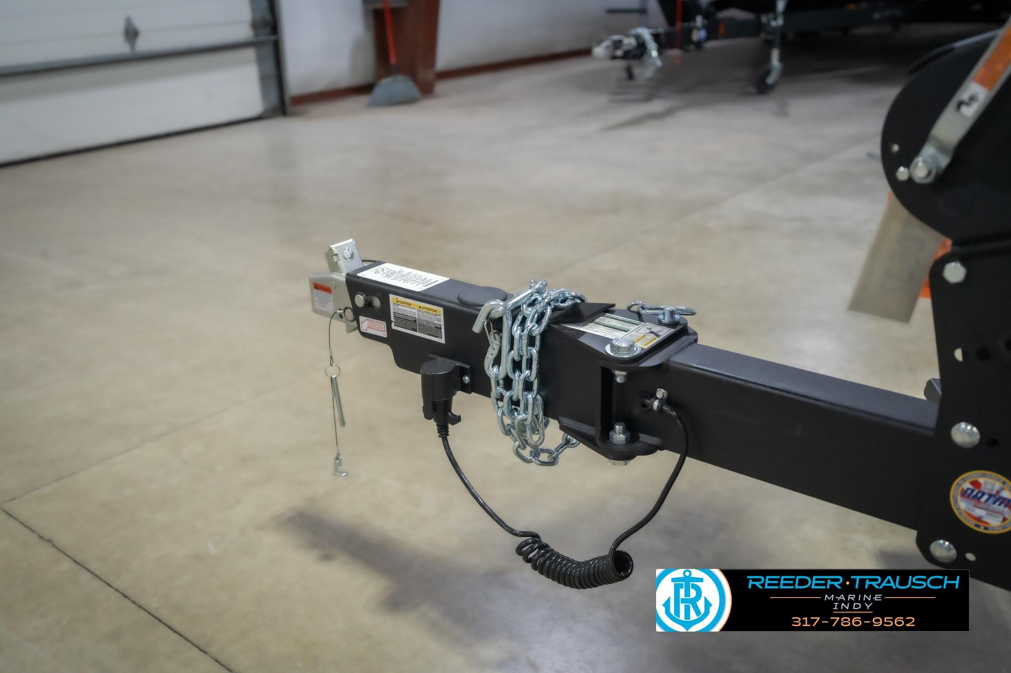 Trailer hitch of 2026 Lund 2075 Impact XS in a garage setting.